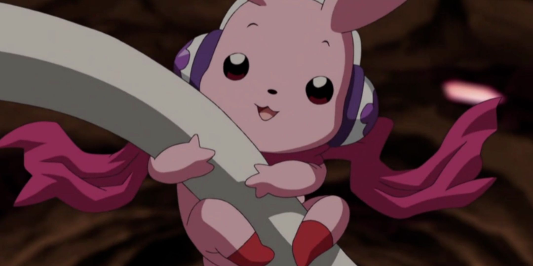 The Digimon Cutemon, a pink rabbit-like creature wearing headphones and a scarf.