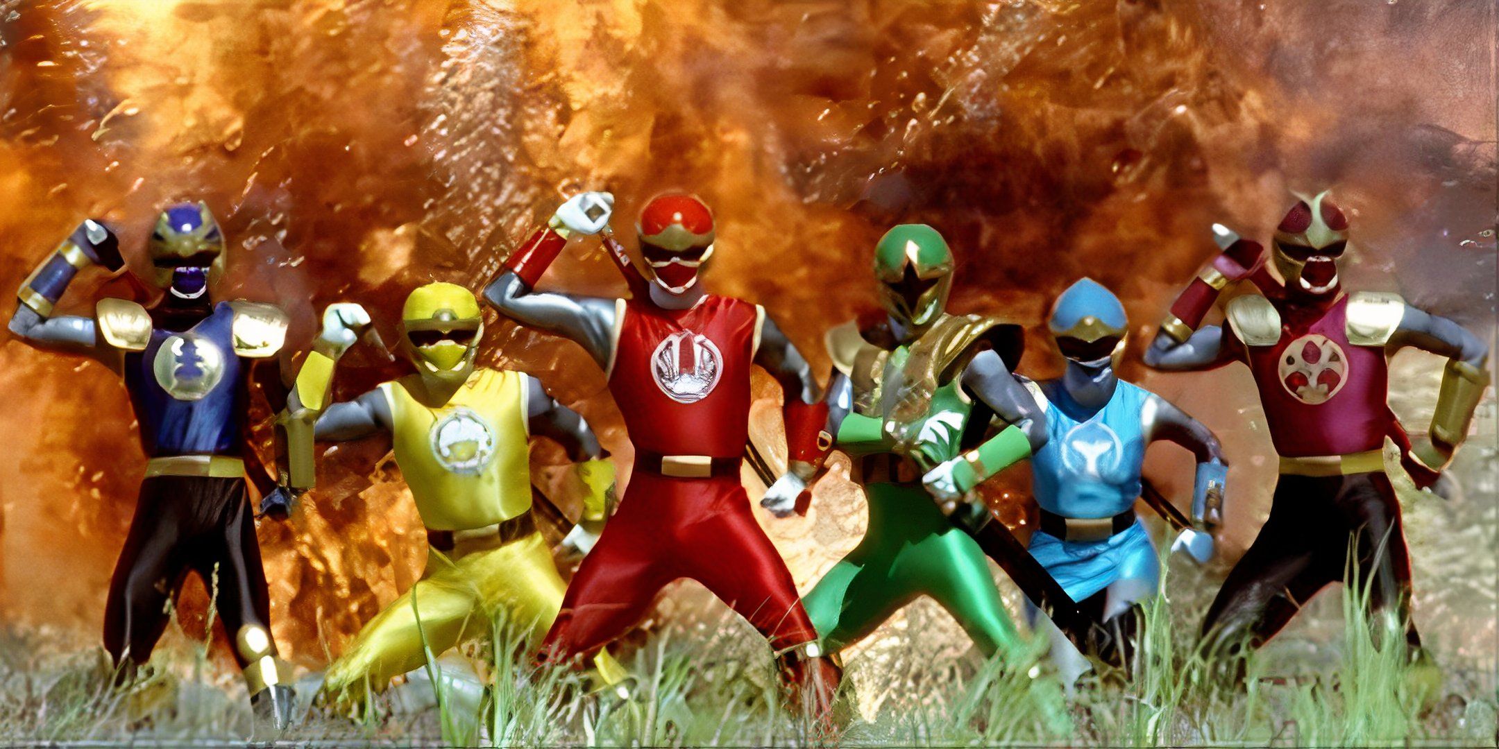 Ninja themed rangers stand in front of explosion