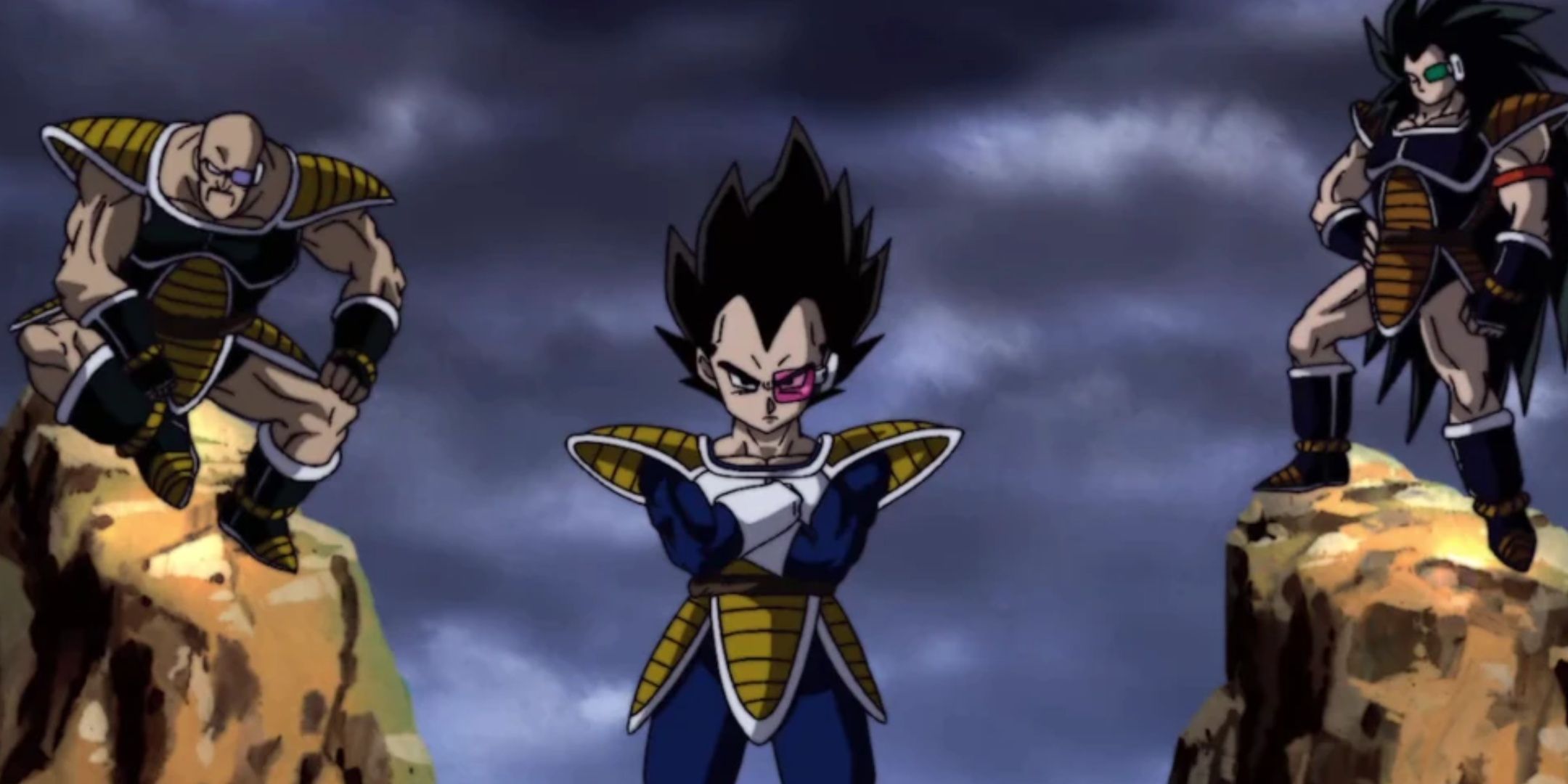 The Saiyans Nappa, Vegeta and Raditz stand ready for battle on a rocky planet with a dark and cloudy sky.