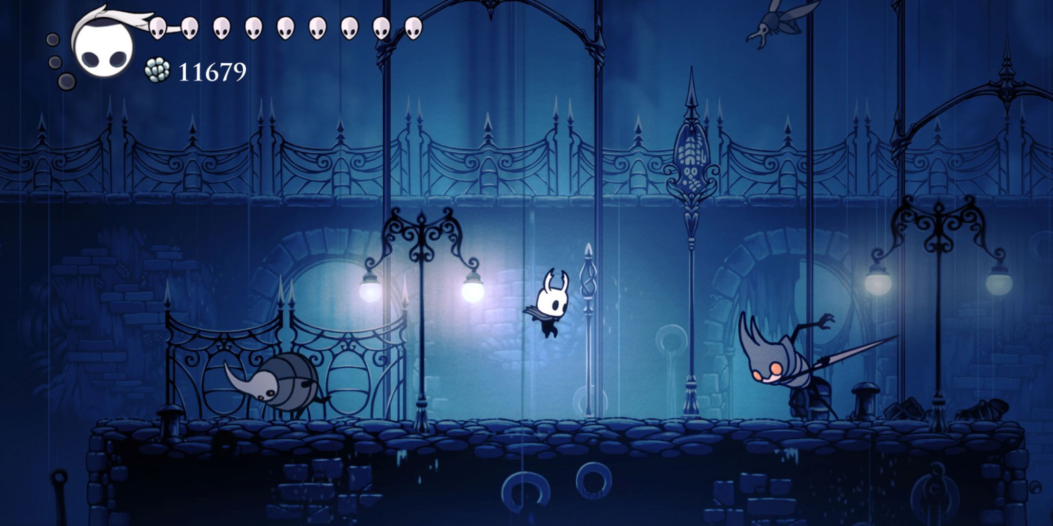 Protagonist, Silent Knight, jumps in the City of Tears in Hollow Knight.