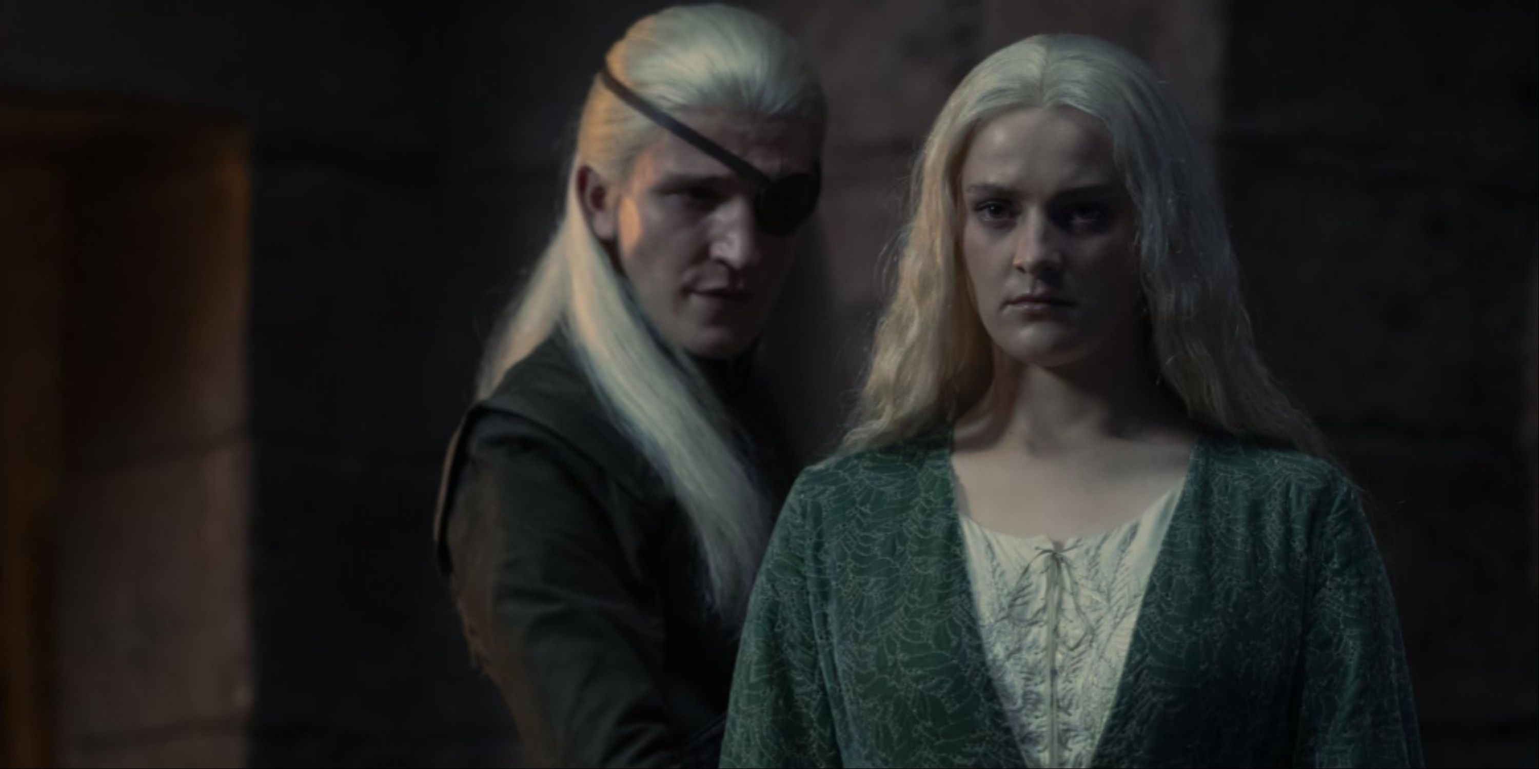 Helaena Looks Away From Her Vengeful Brother As She Confronts Aemond With Her Vision Of His Death.