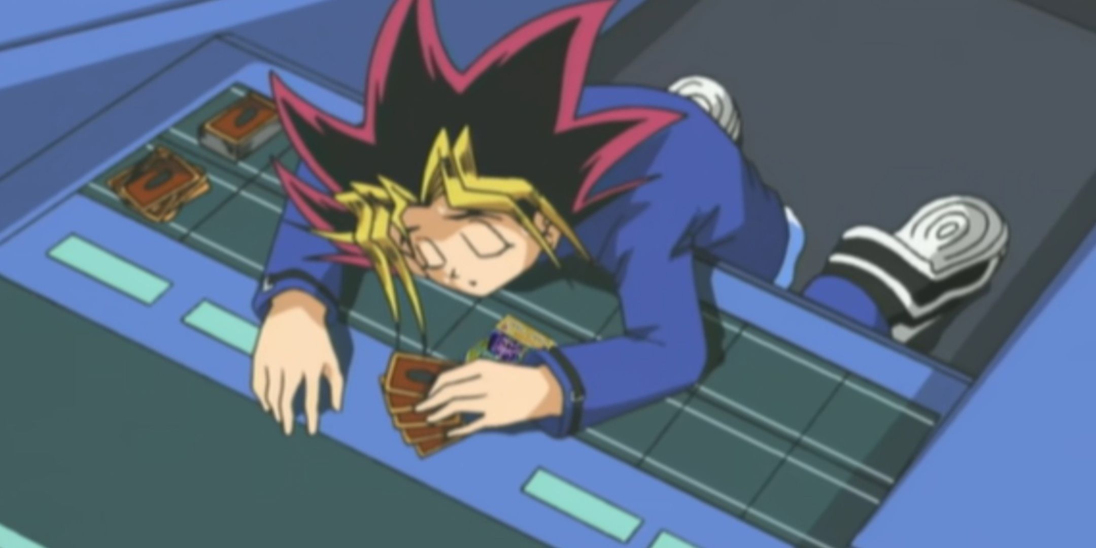 Yugi collapses during his duel with Pegasus.