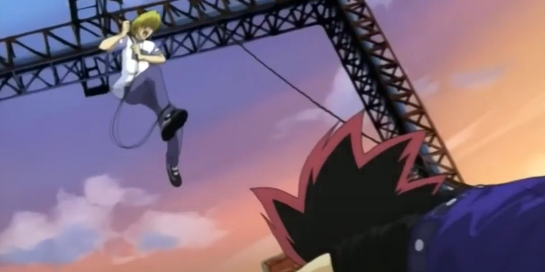 Joey rushes to save Yugi at the end of their Battle City duel.