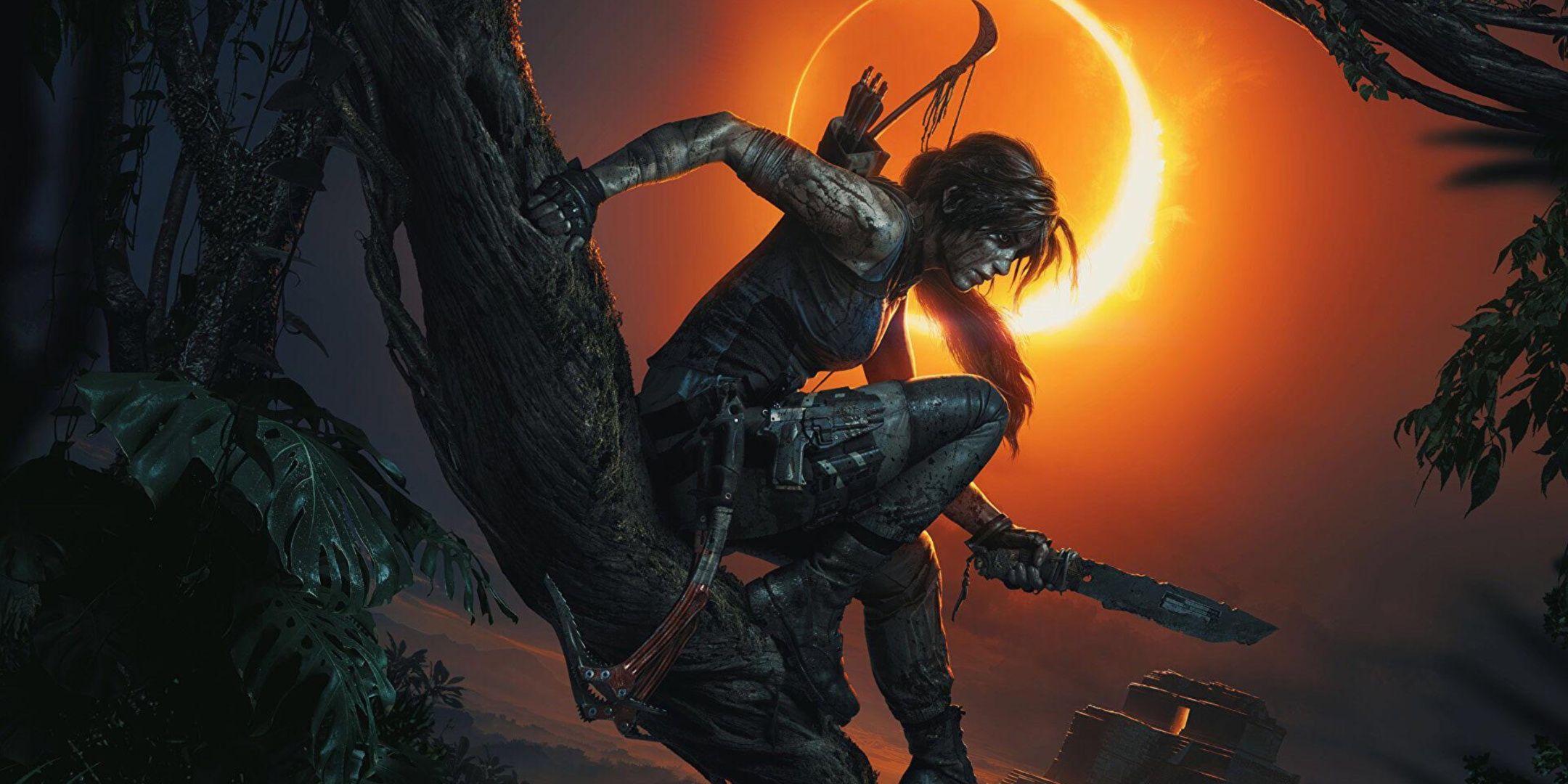 Lara Croft holding a knife in Shadow of the Tomb Raider.