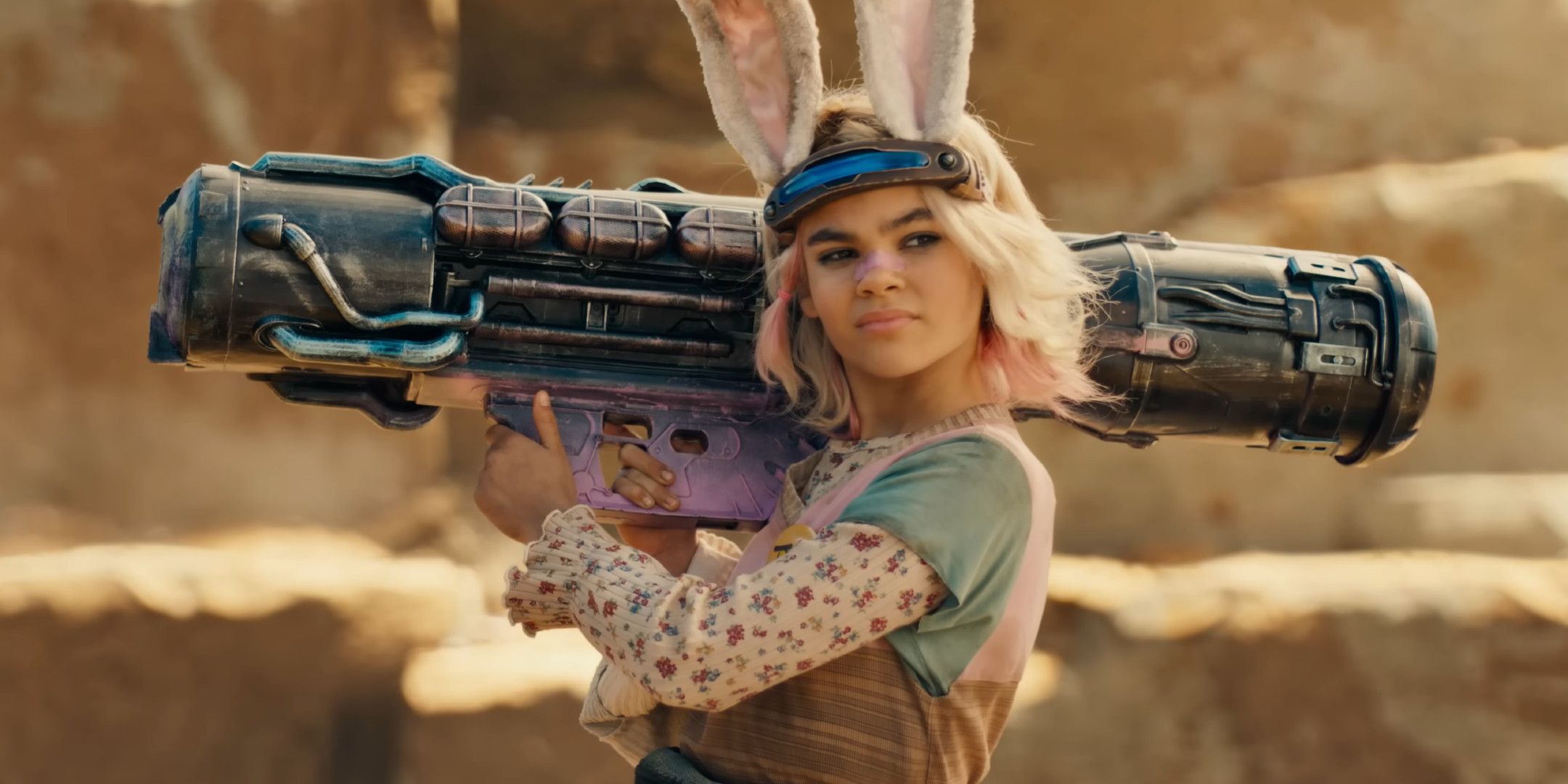 Little Tina in the movie Borderlands holds a large rocket launcher