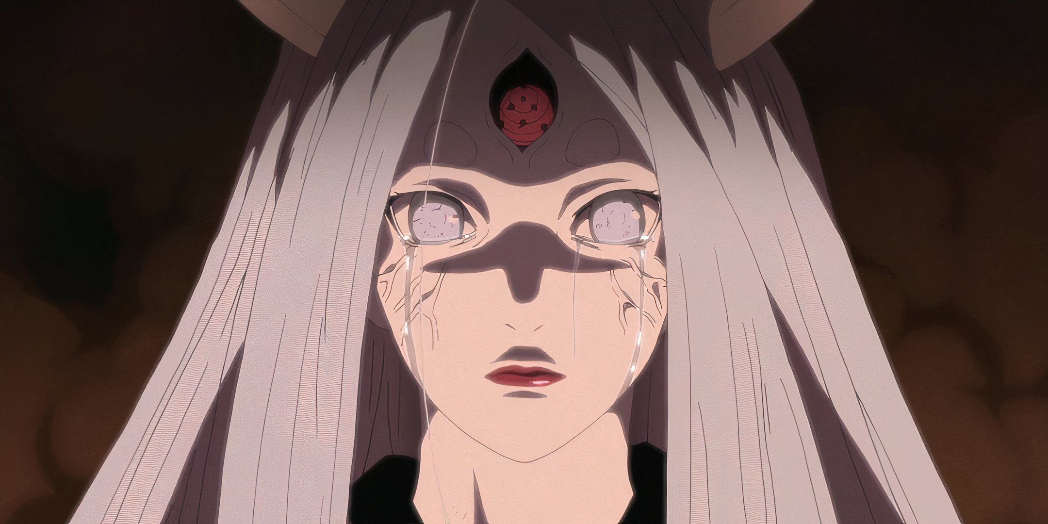 Kaguya crying while holding Naruto and Sasuke in Naruto Shippuden.