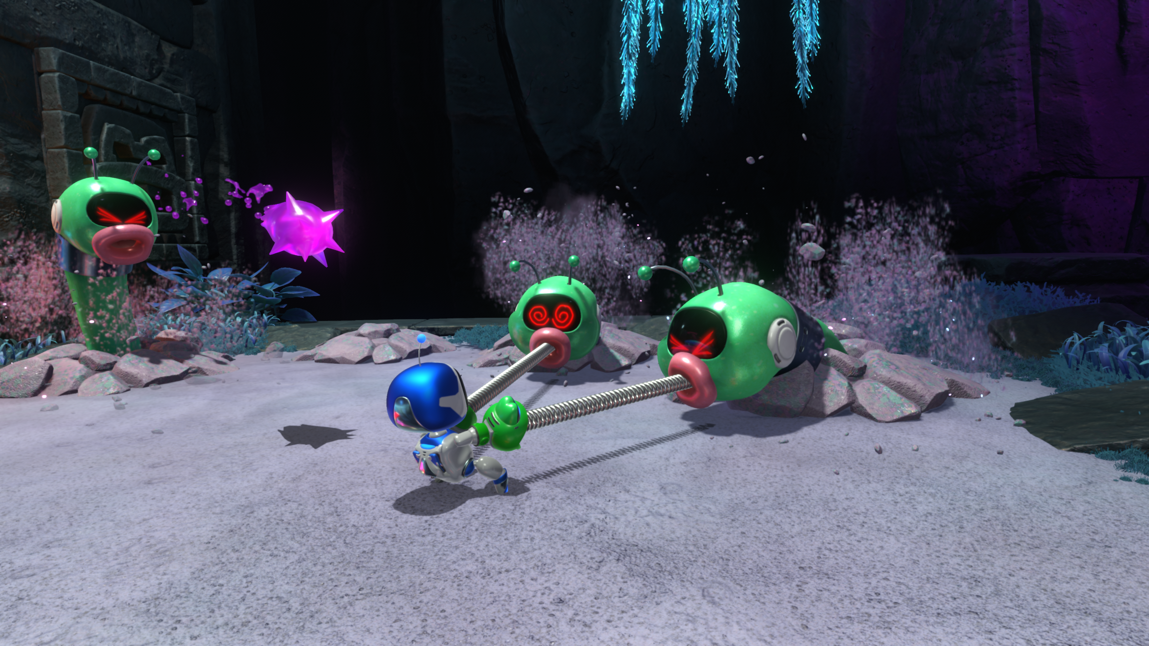 Astro Bot attacking two Wormys