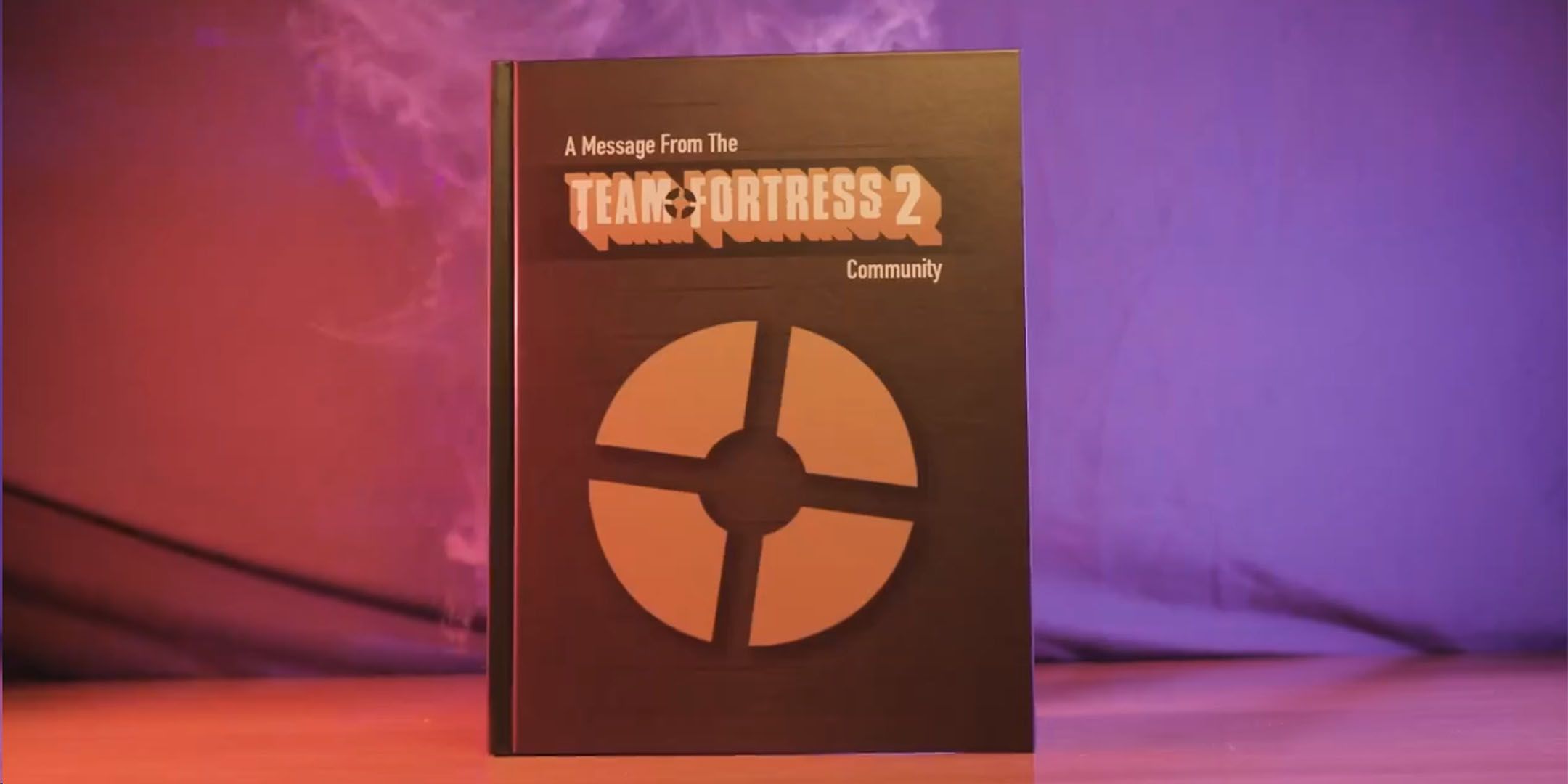 Book on a table called A Message From The Team Fortress 2 Community