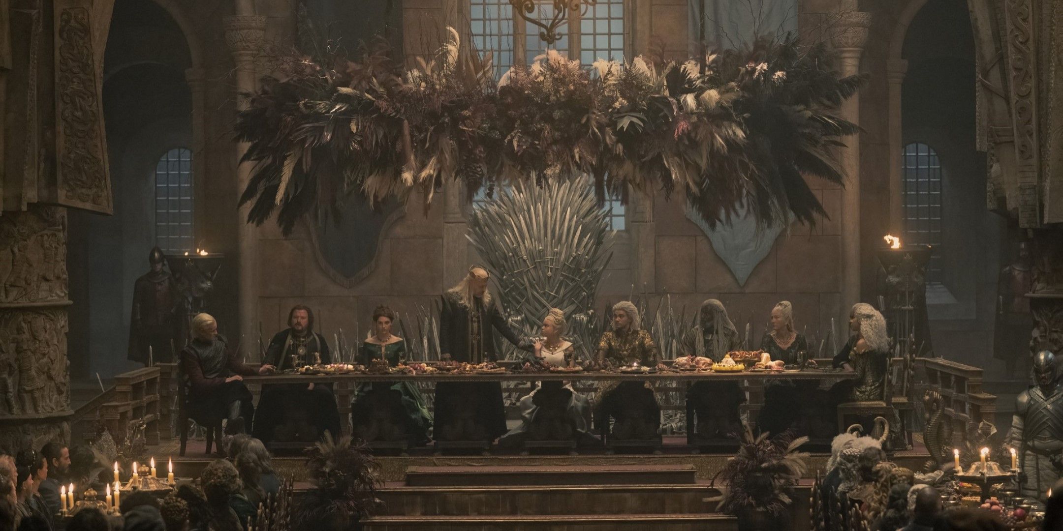 A screenshot from House of the Dragon, showing many key characters together at a feast.