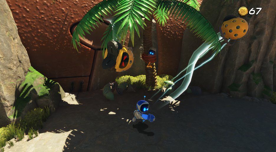 Astro Bot Go Go Archipelago bot tied to a palm tree