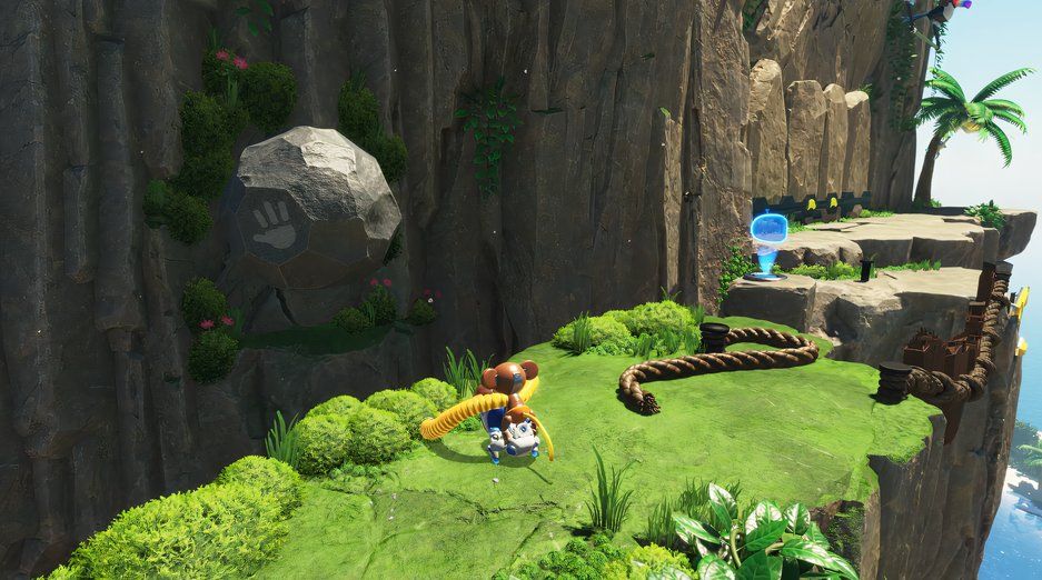 Astro Bot Go Go Archipelago throwing boulder into cliff to free jigsaw