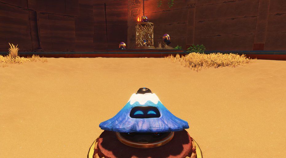 Astro Bot Hieroglitch Pyramid volcano launching at caged bot