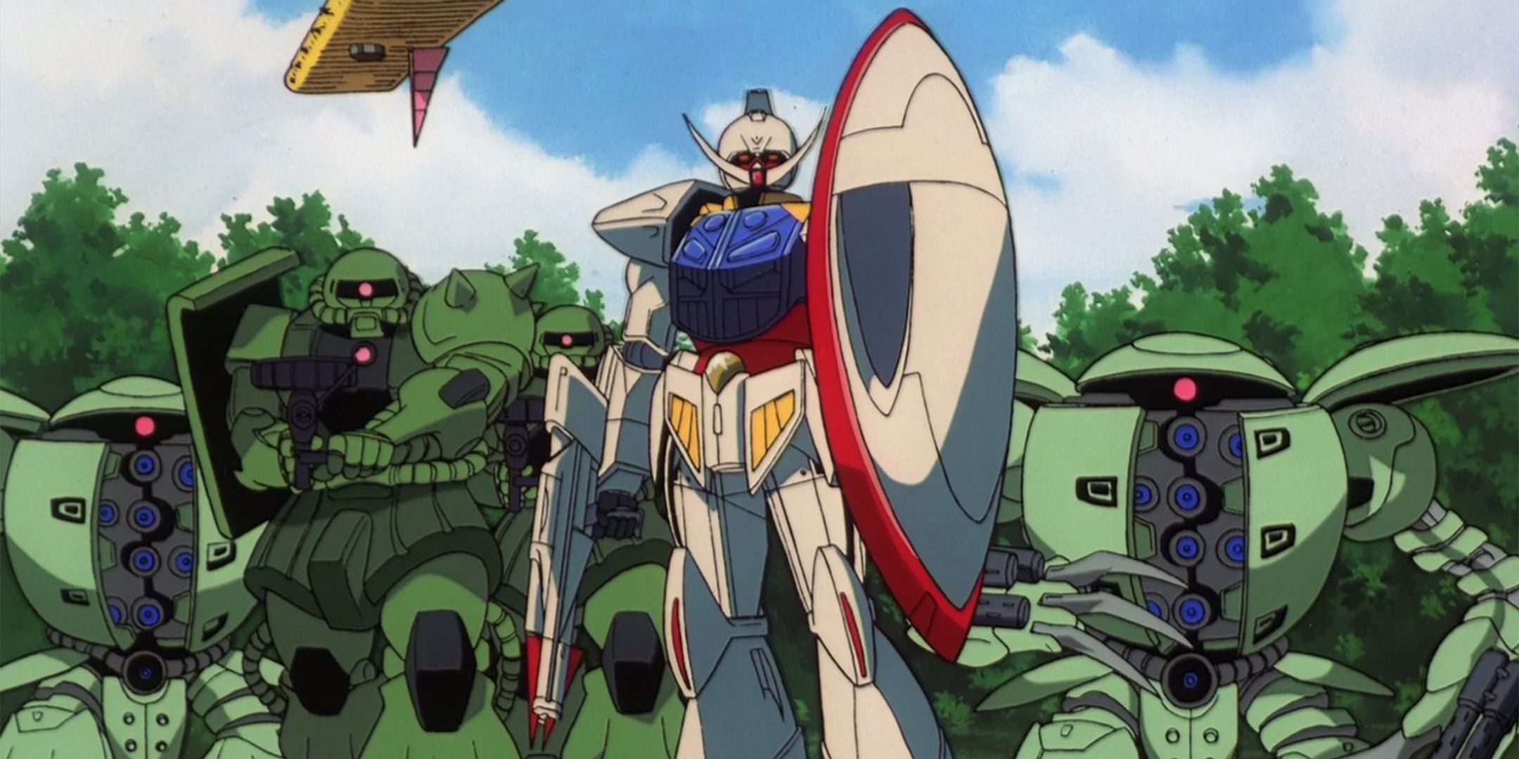 The Turn A Gundam with its rifle and shield standing in front of an army of Zeon mobile suits.