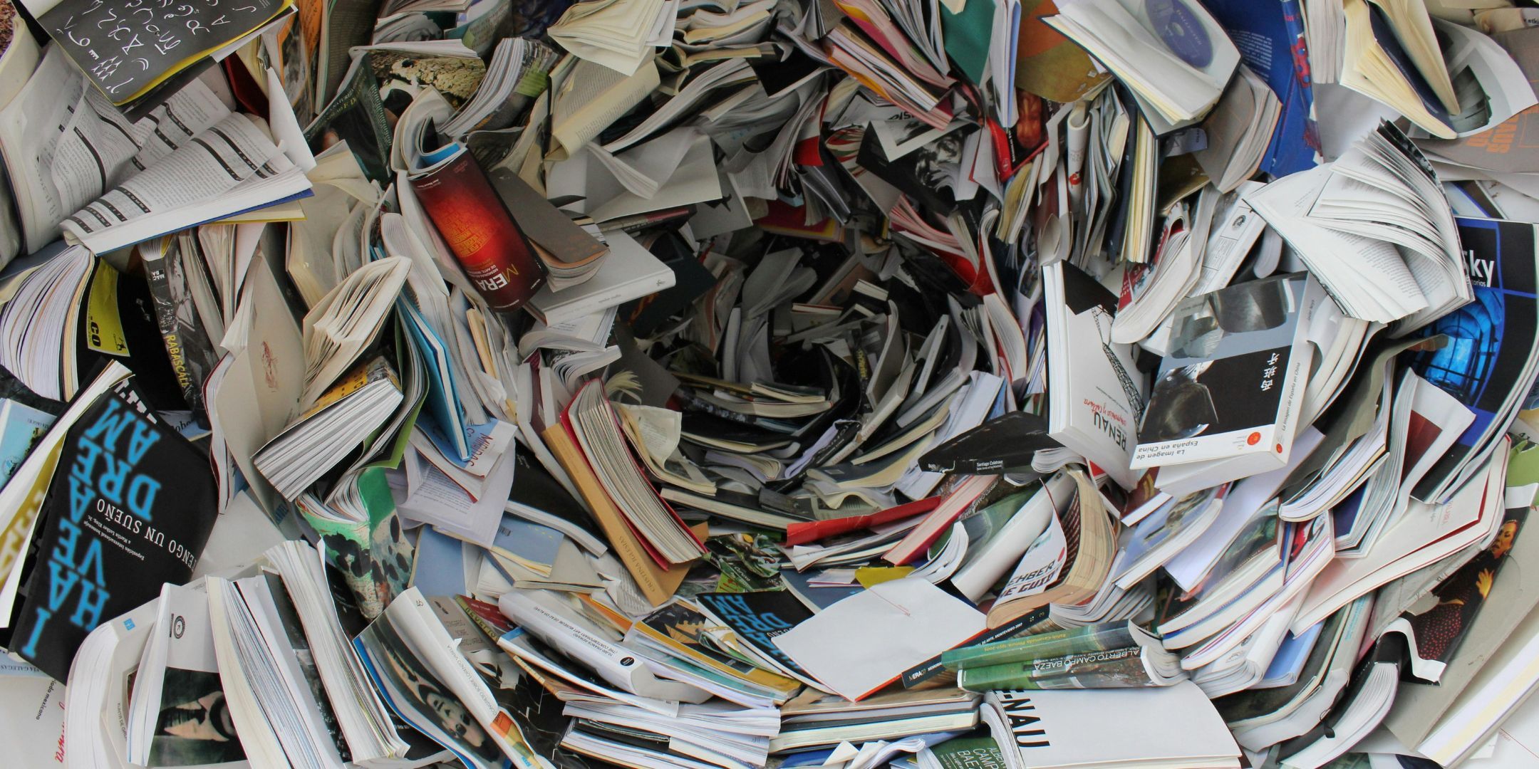 image of an overlaoded libarary. its books, but works for represntaion