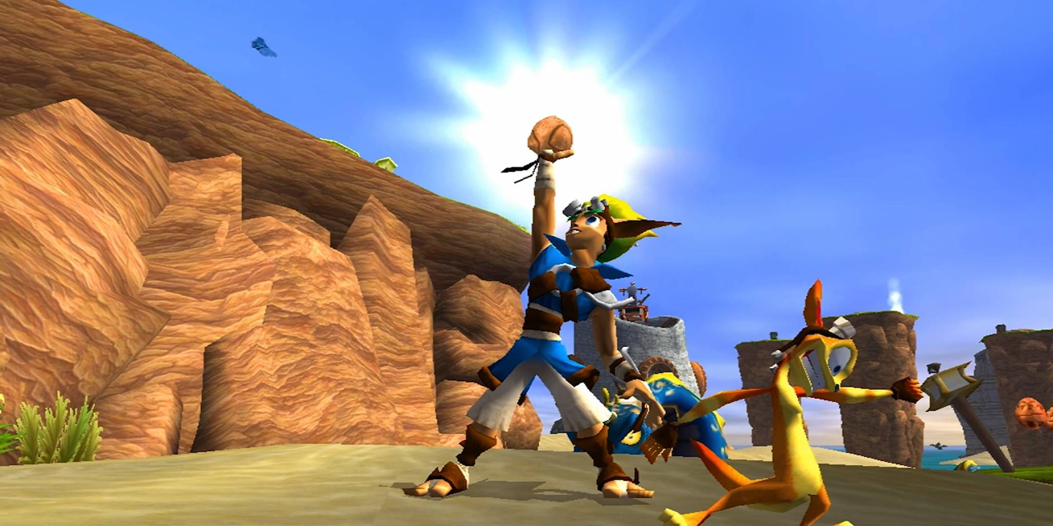 Jak grabbing a power cell on a beach as Daxter dances in Jak and Daxter.