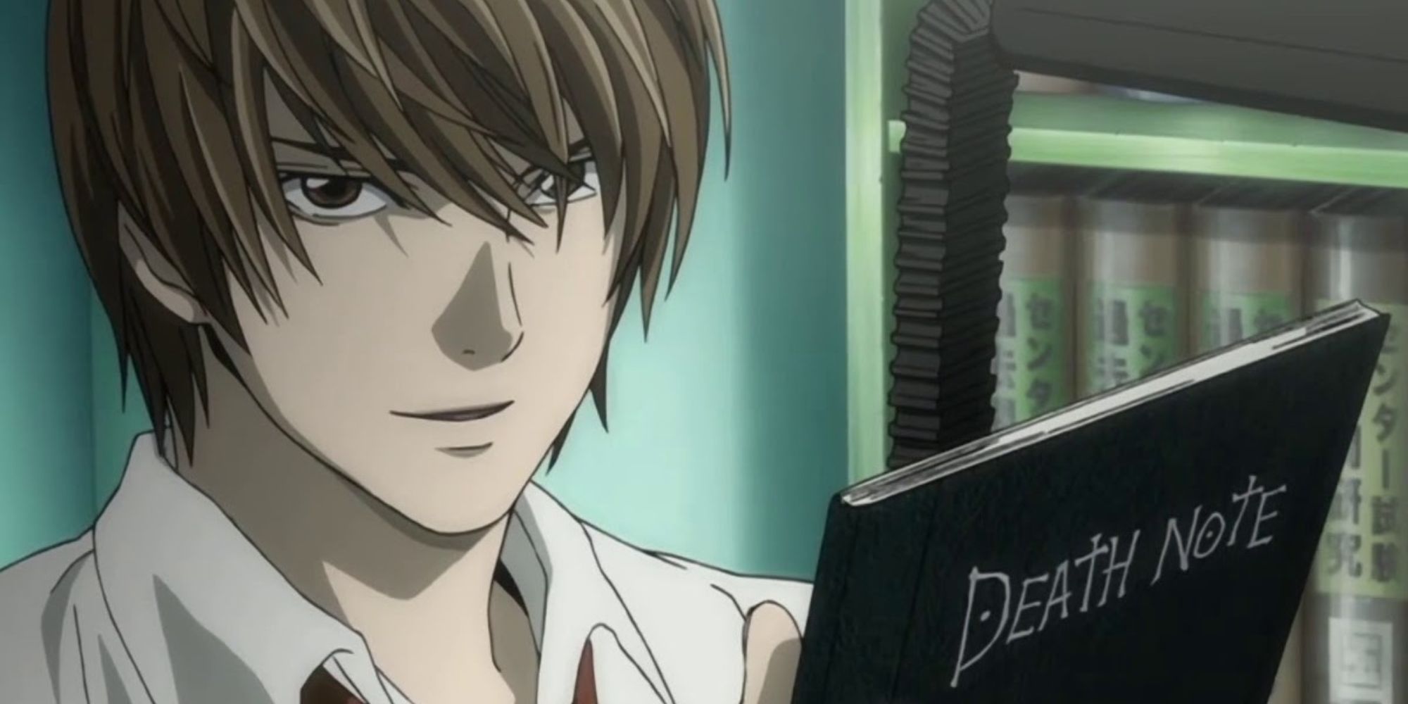 Light Yagami holds Death Note in Death Note.