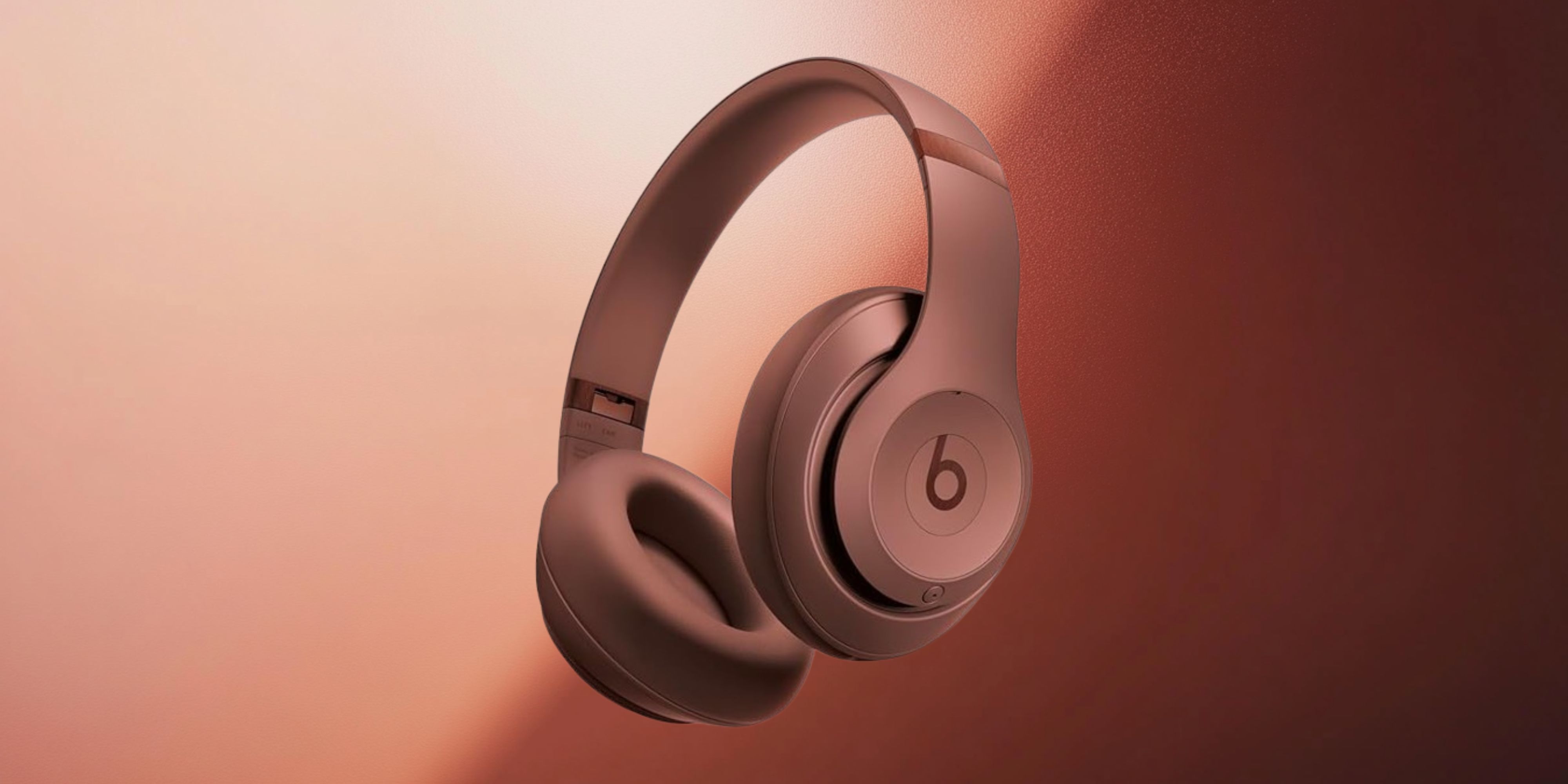 Image of Beats X Kim Kardashian headphones on a gradient background