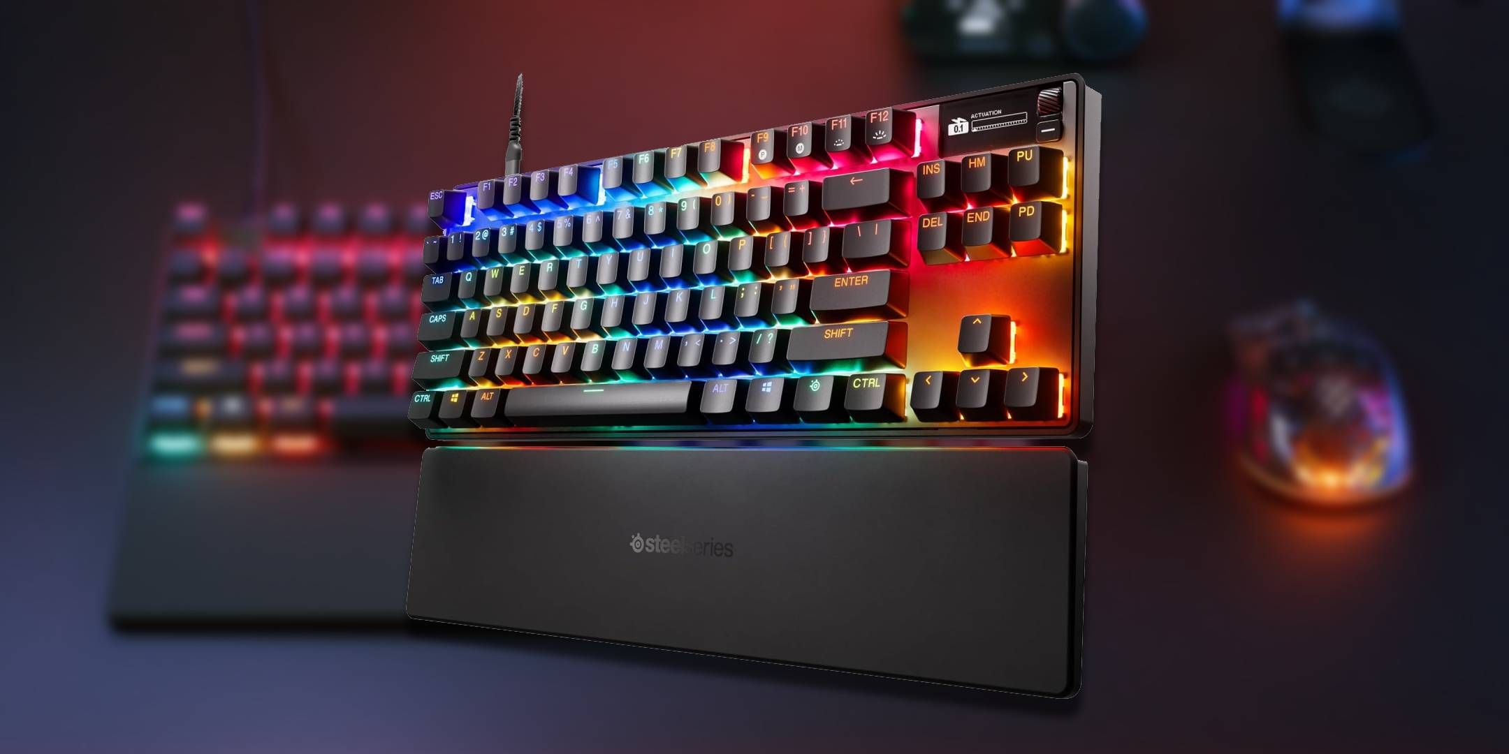 The Apex Pro Gen 3 Keyboard on display before a glowing keyboard.