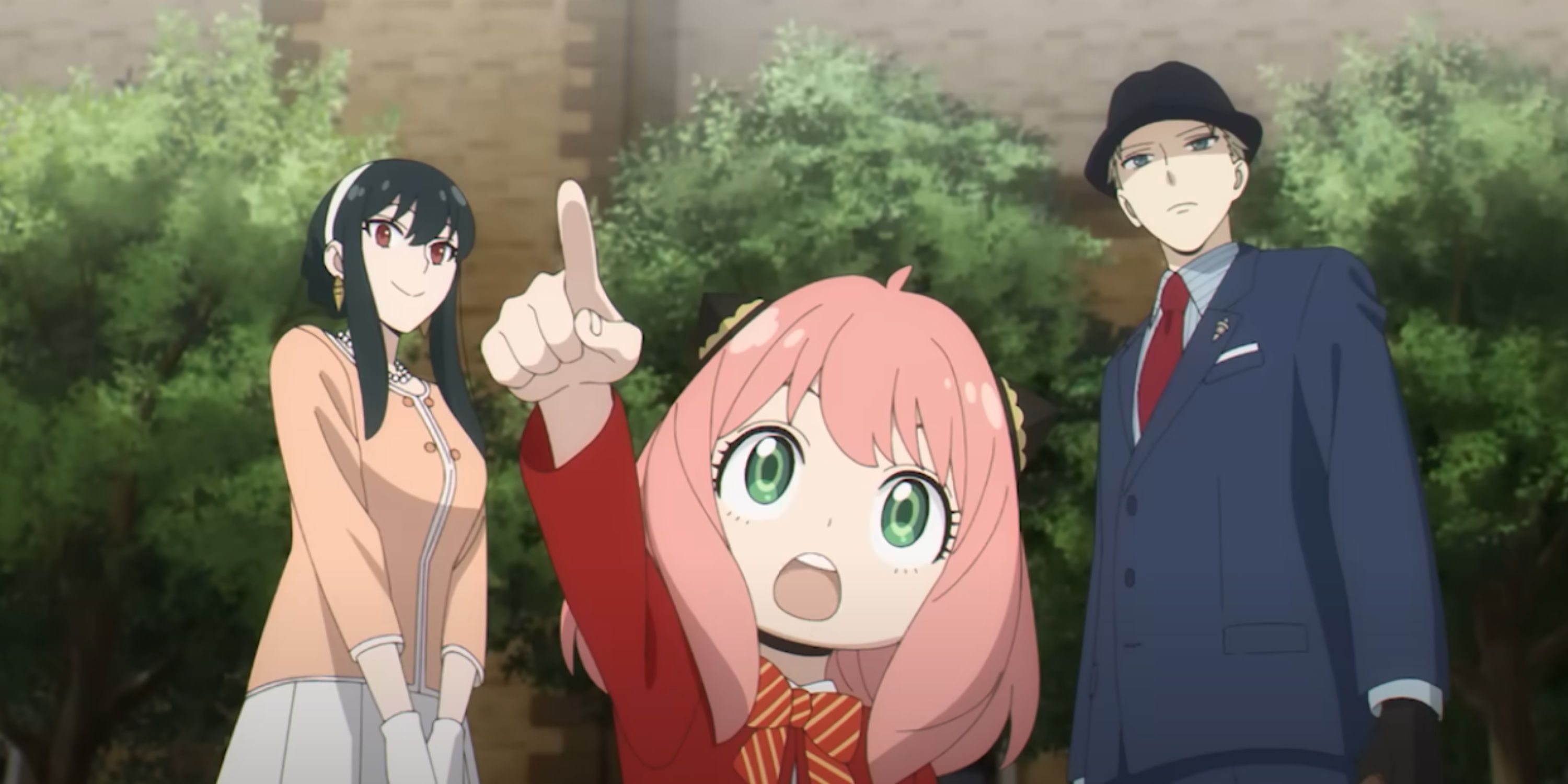 Anya pointing out something to her adoptive parents in Spy X Family.