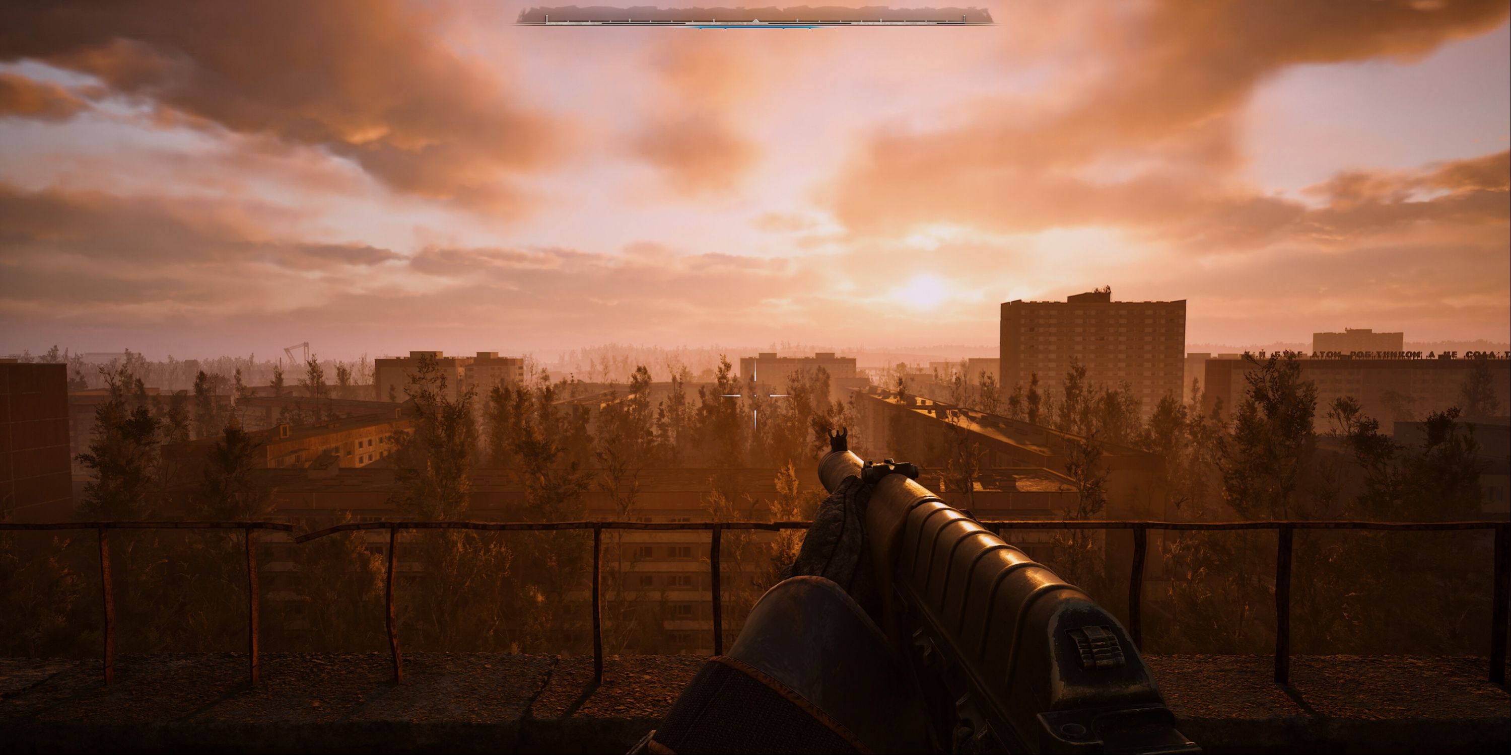 Stalker  2 - The player admiring the view of the city during a rosy sunset.