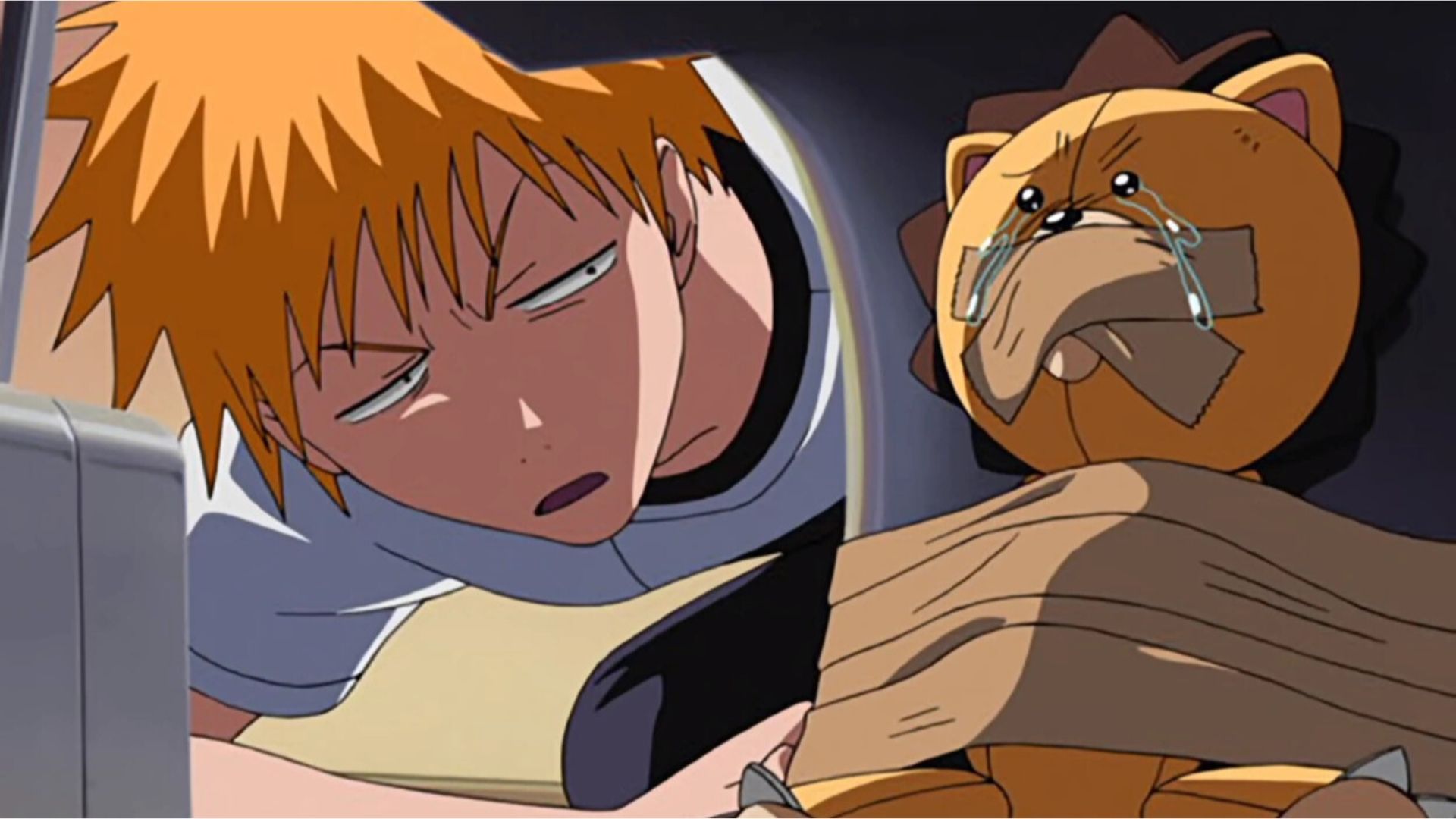 Kon from Bleach tied up.