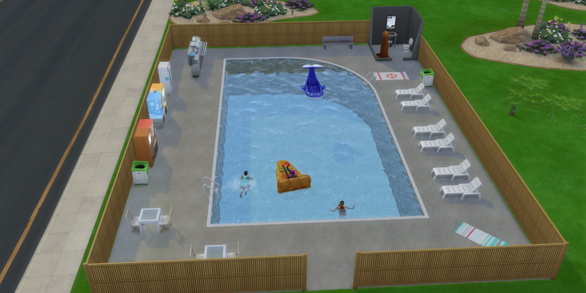 Image of a public pool build with Sims playing in the pool from The Sims 4.