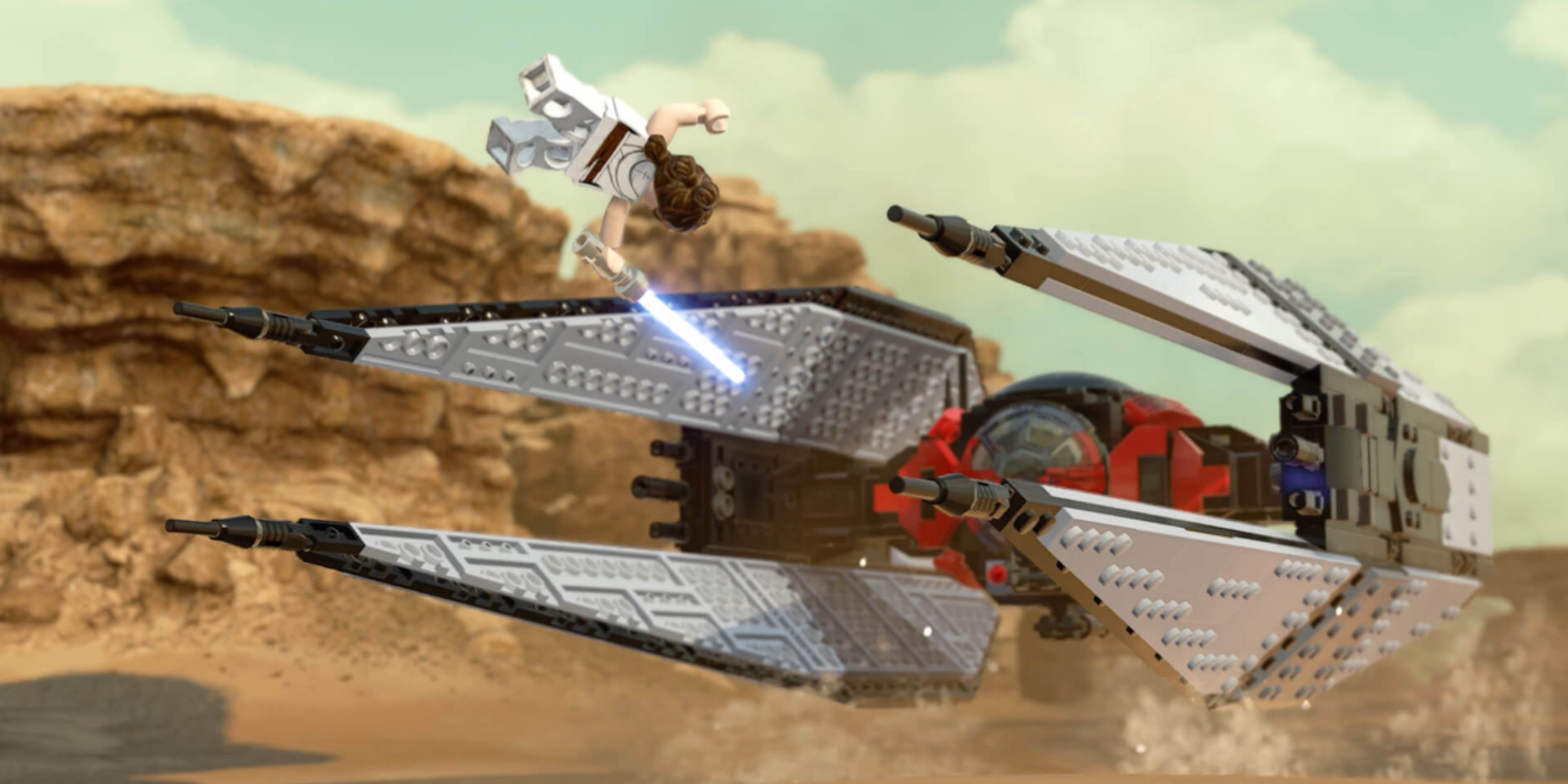 rey jumping in front of a tie interceptor in lego star wars the skywalker saga.