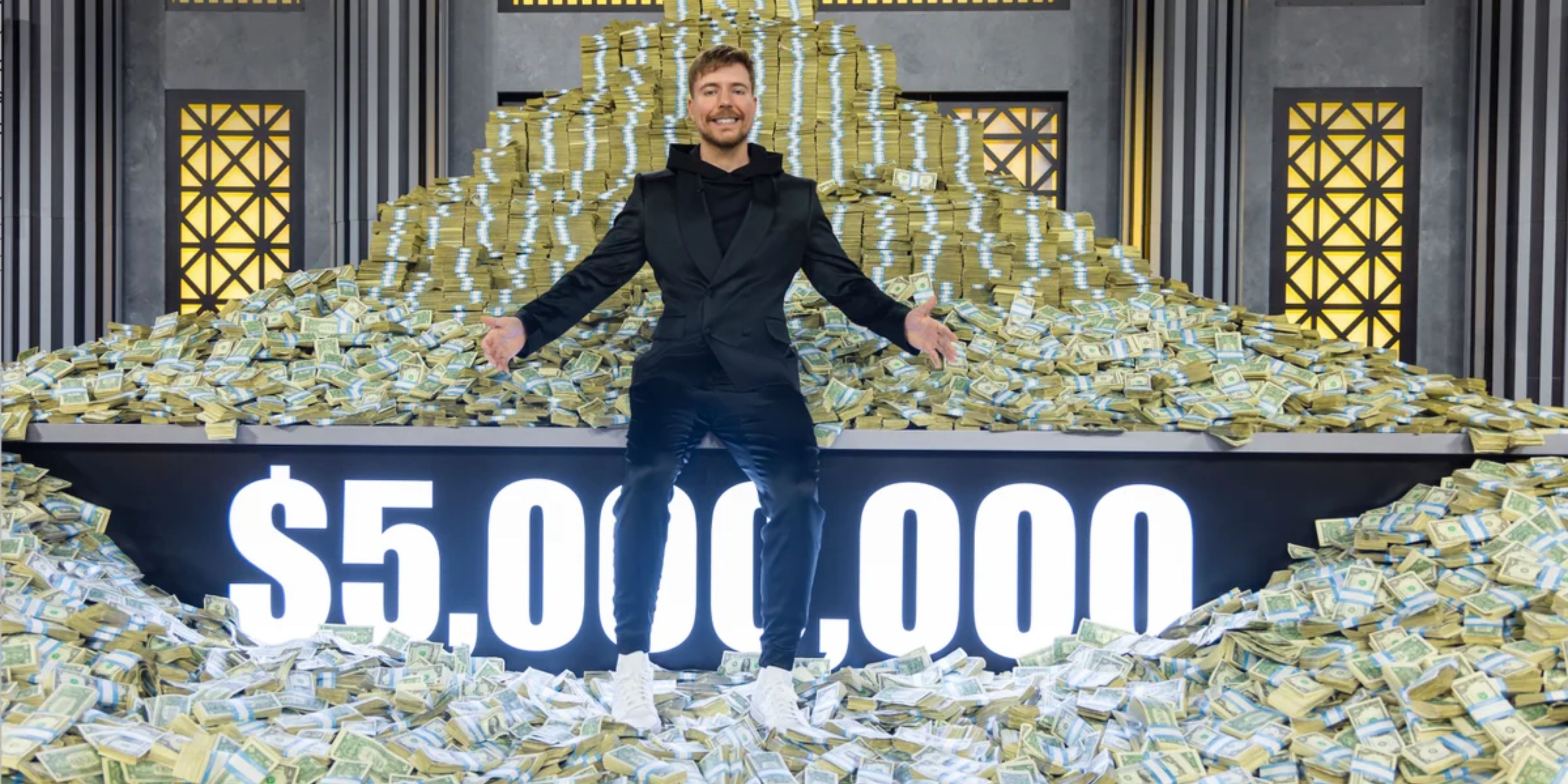 MrBeast in front of the Beast Games prize money