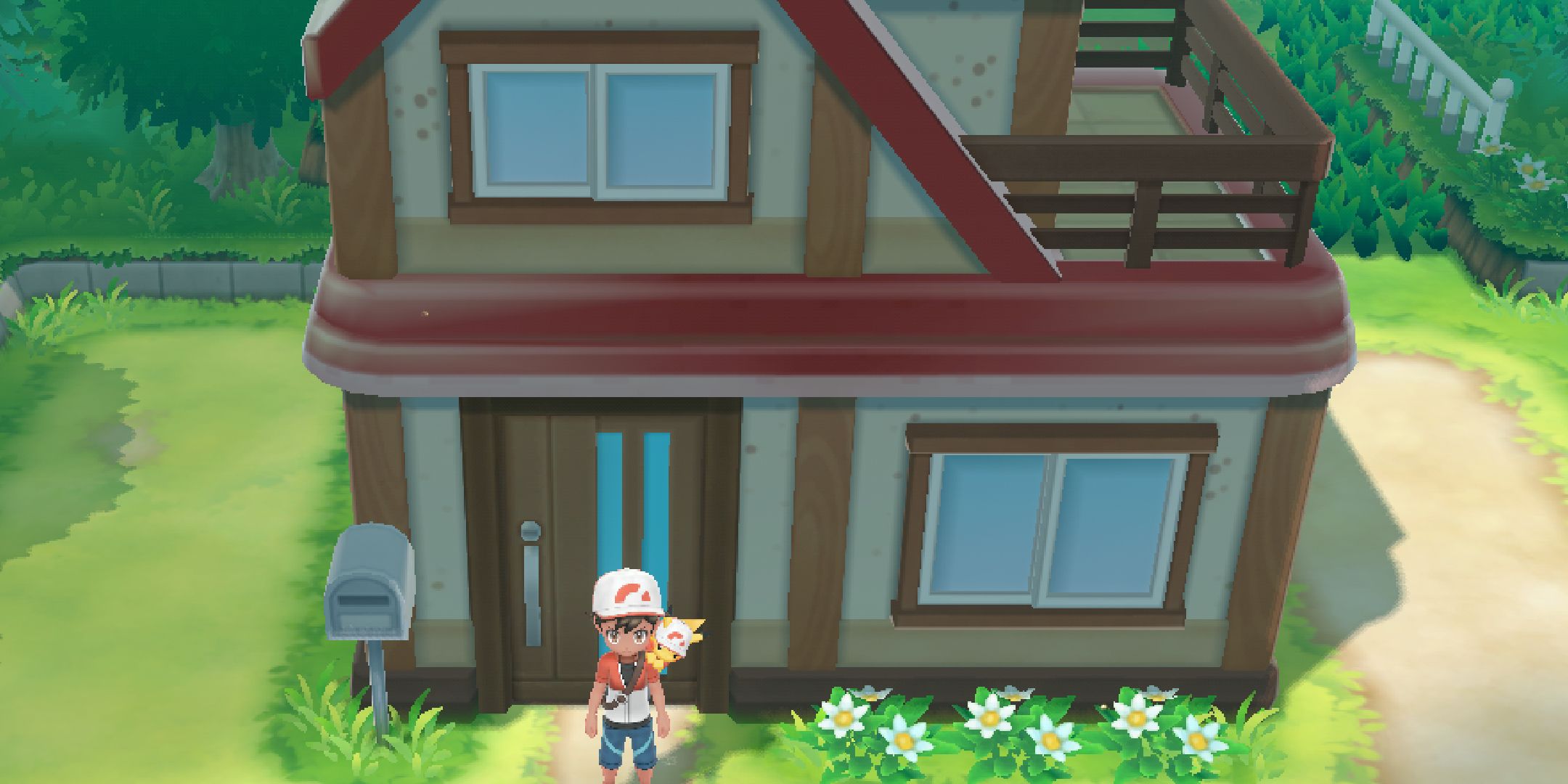 Pokemon Lets Go Pikachu and Eevee player standing outside of their two floored home.