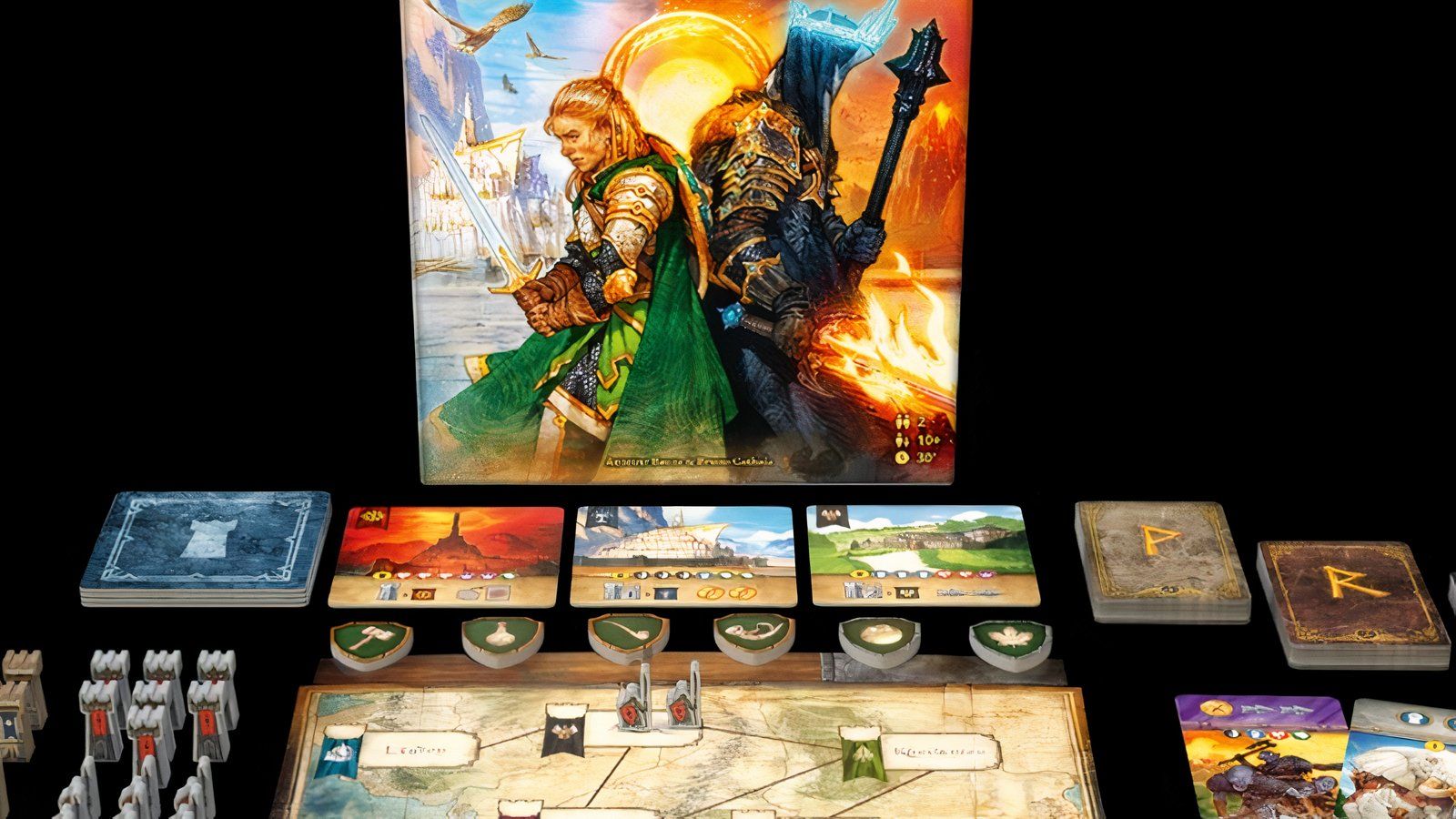 The Lord of The Rings: Duel for Middle-Earth board game with box cover in the back and cards, board, and figurines in the front on table.