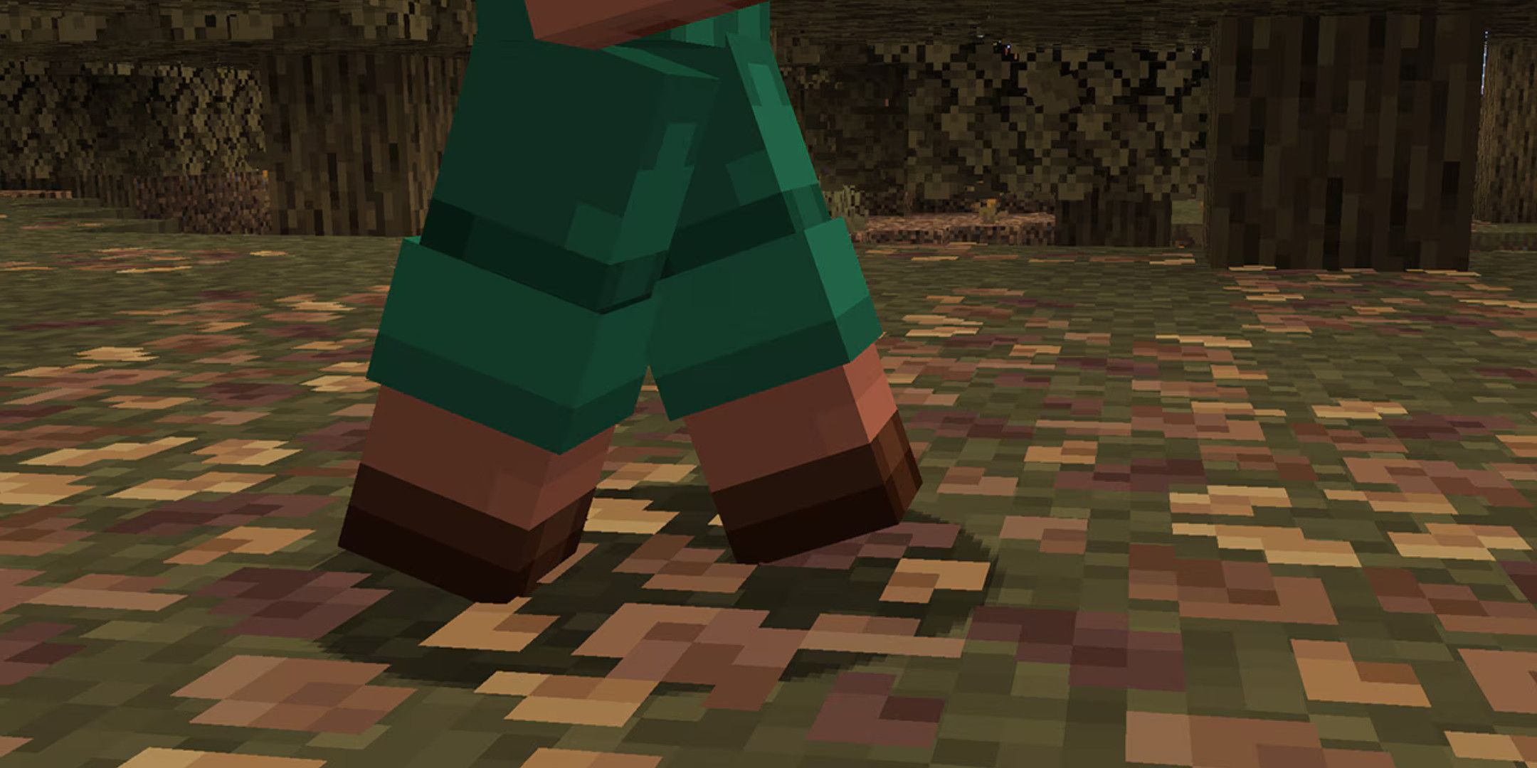 A pair of legs of a Minecrfat character walking over crunchy leaves