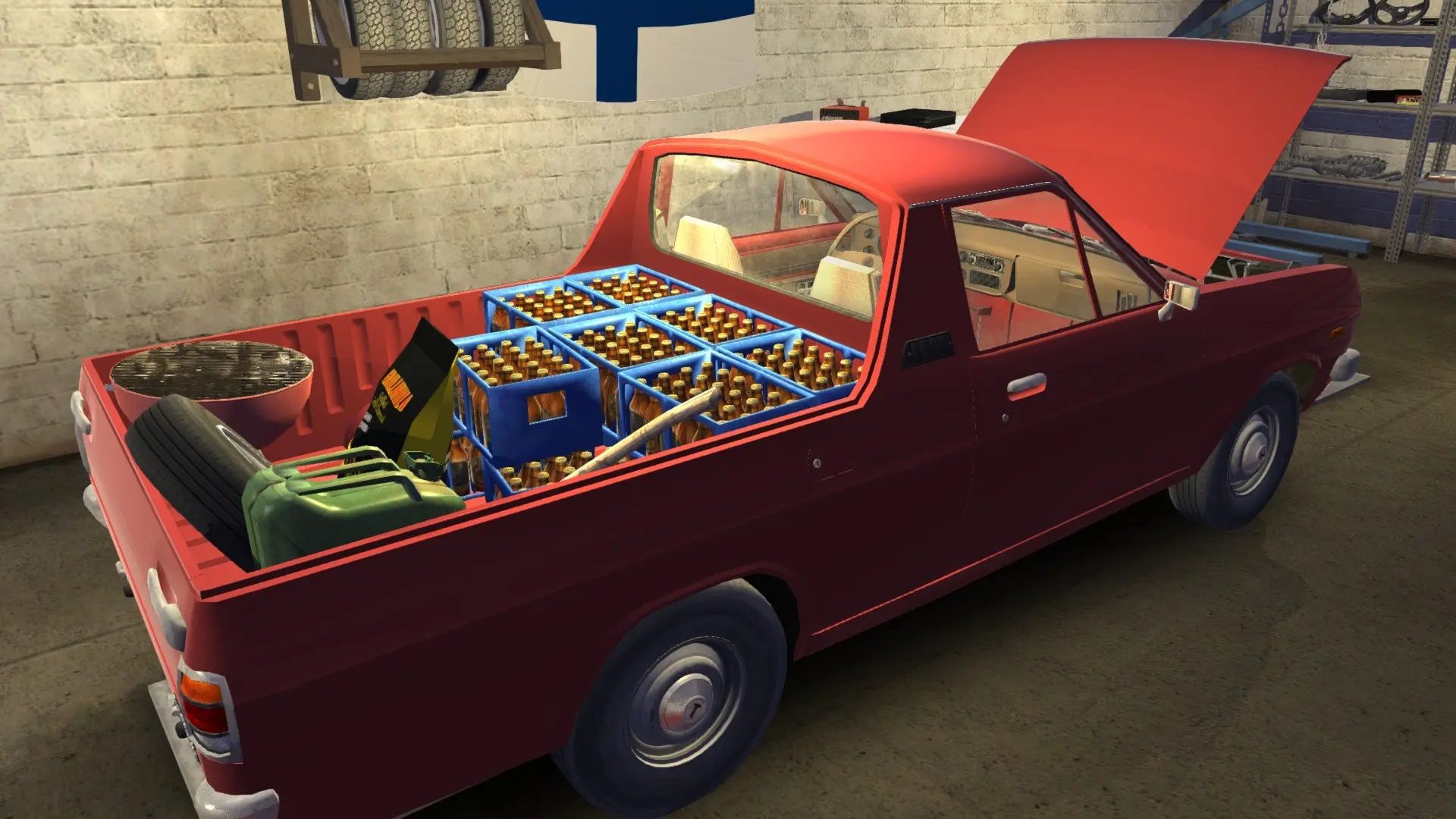 A red pickup sits with the hood open inside a garage.