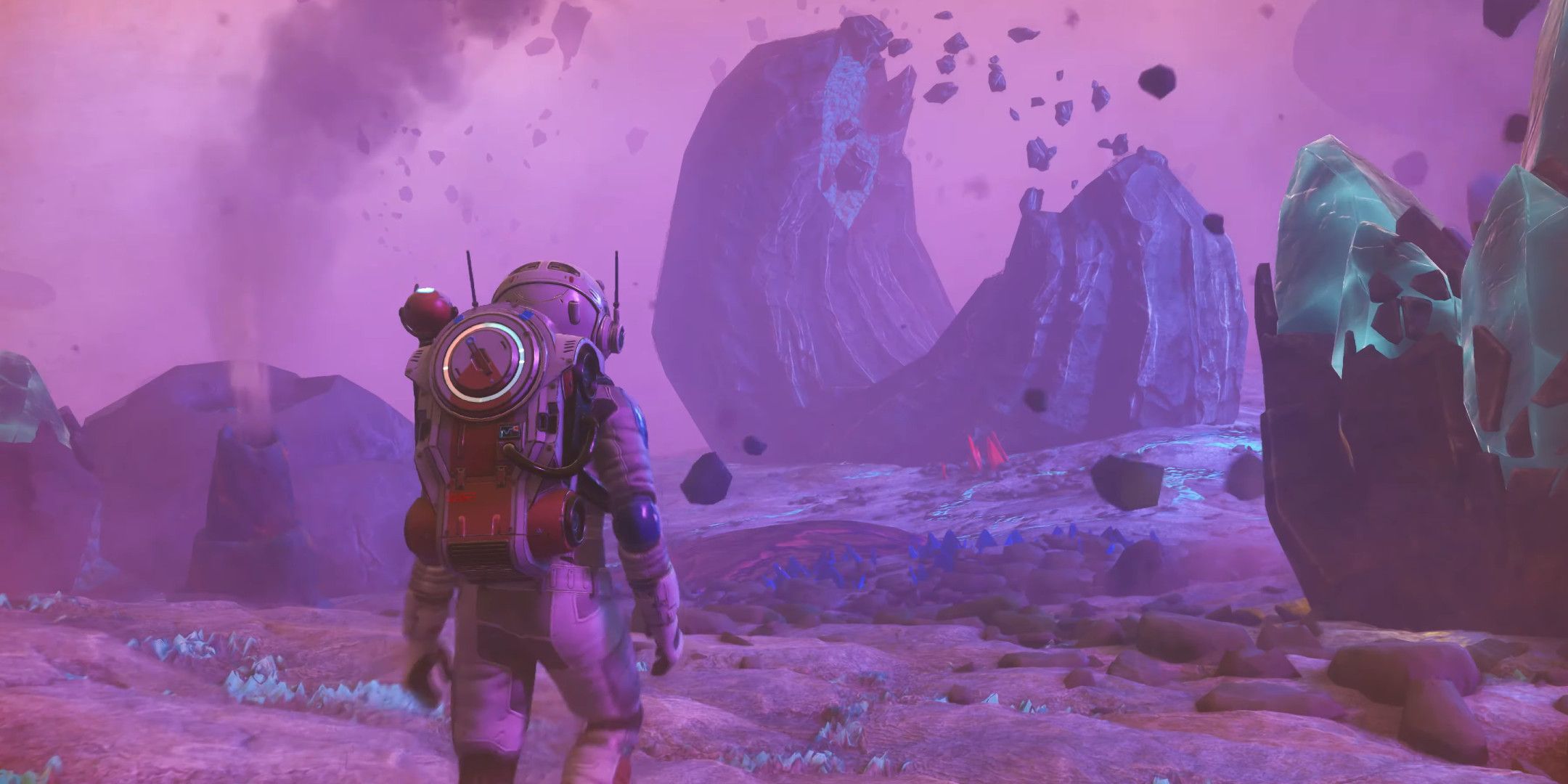 An astronaut on a purple planet covered in colorful rocks