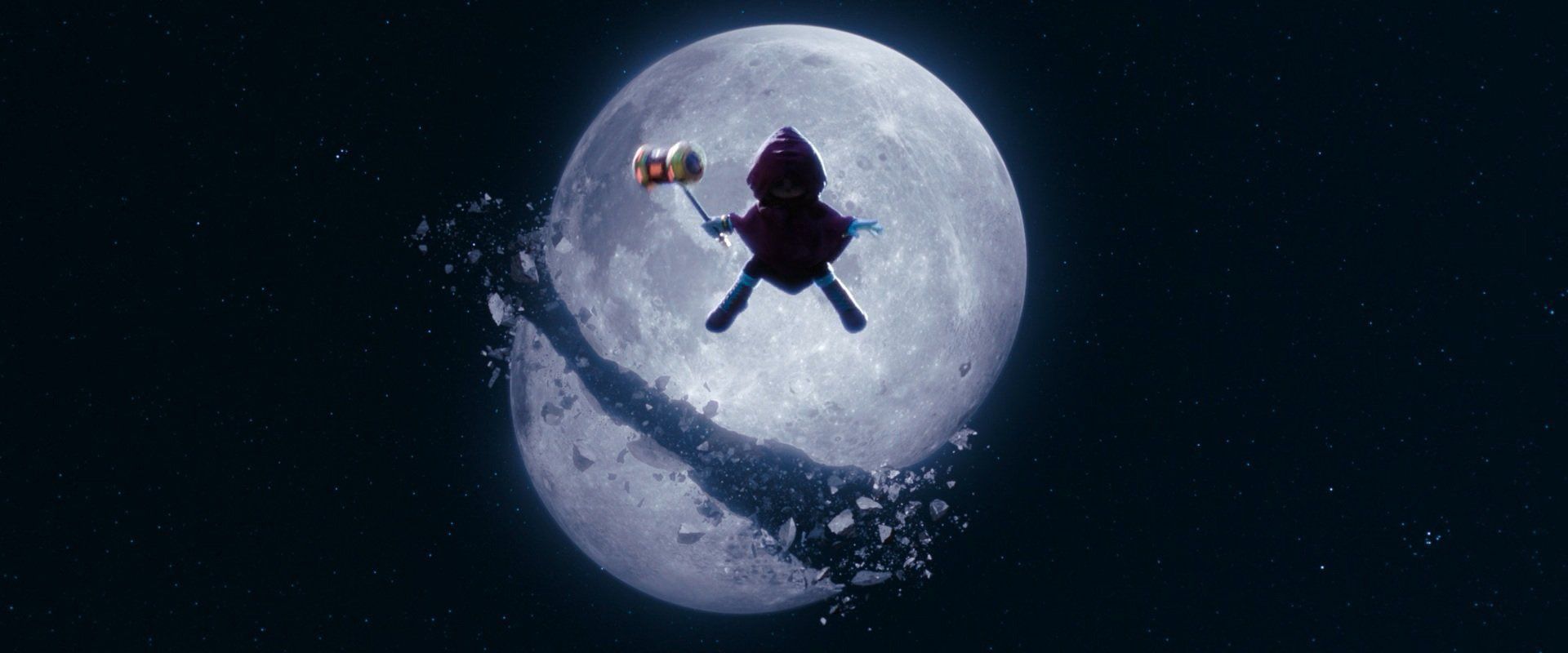 A hooded Amy Rose appears in front of the moon in Sonic the Hedgehog 3. 