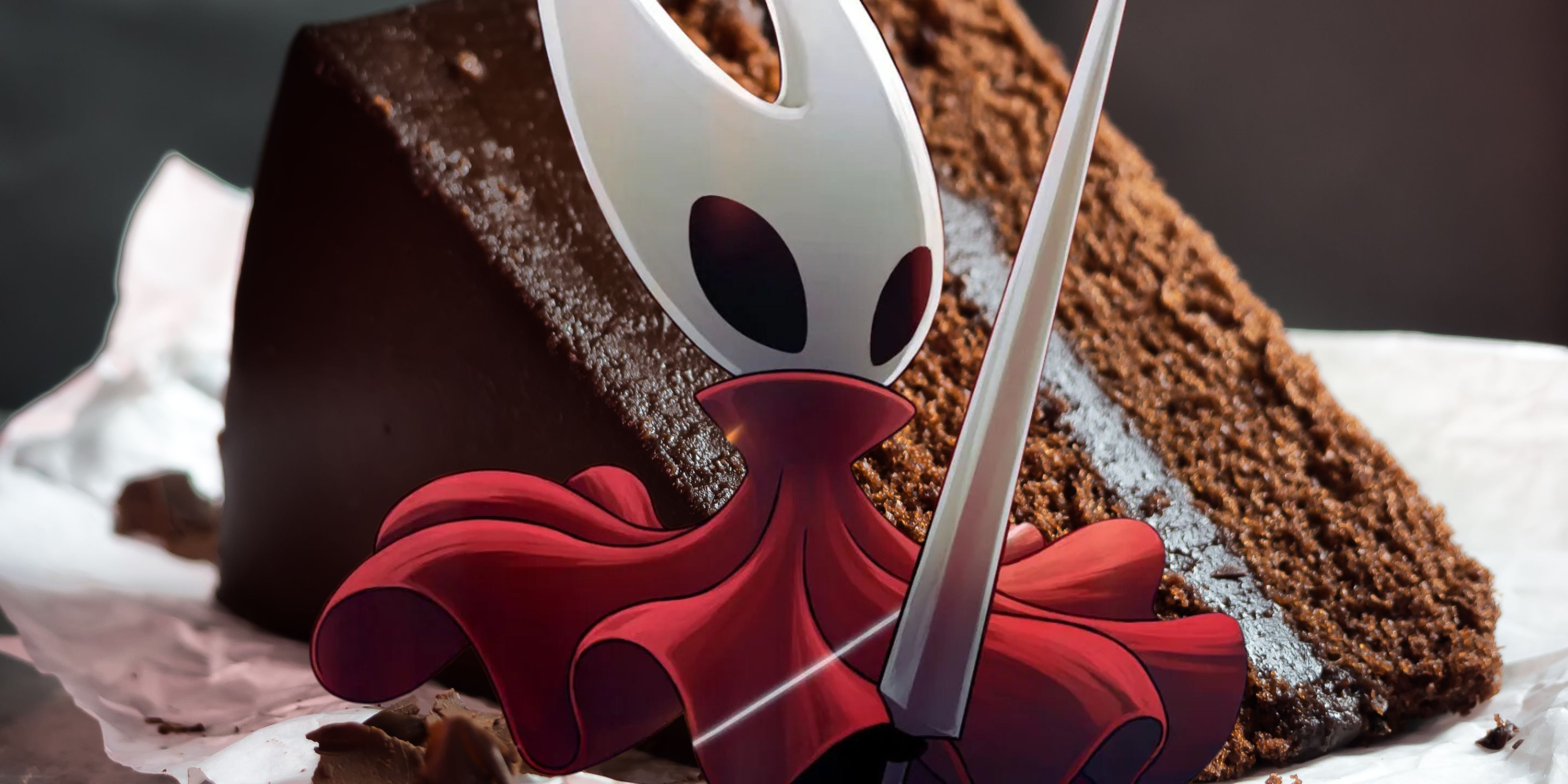 Hornet from Silksong in front of a chocolate cake