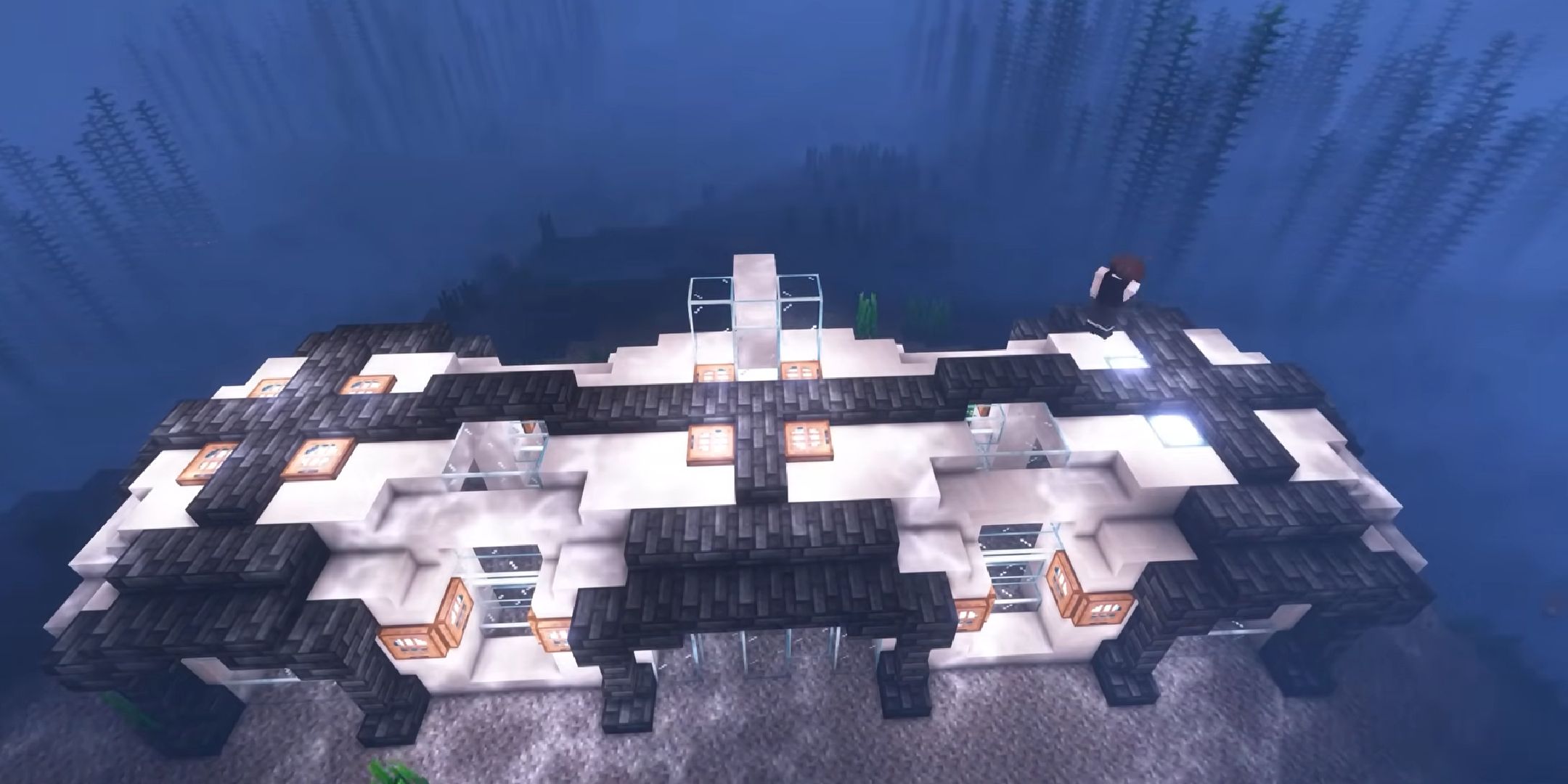 Lomby working on an underwater base in Minecraft.