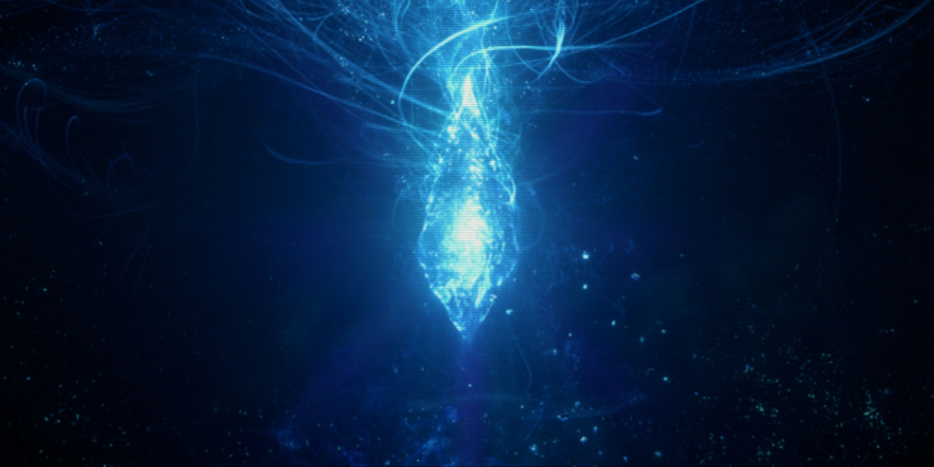 The mothercrystal from Final Fantasy 14, a massive glowing blue crystal in a dark landscape.