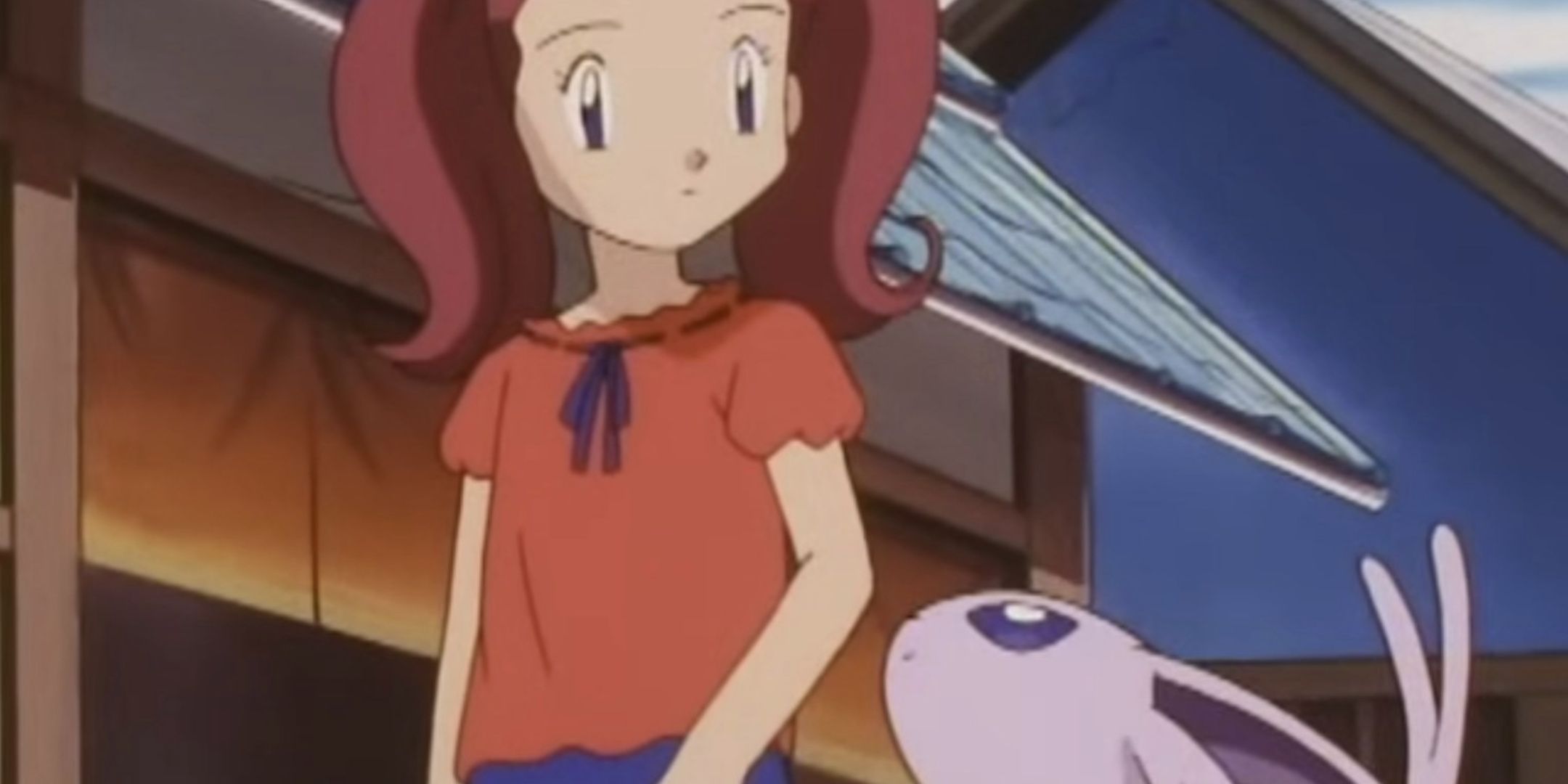 Sakura and her Espeon in the Pokemon anime.