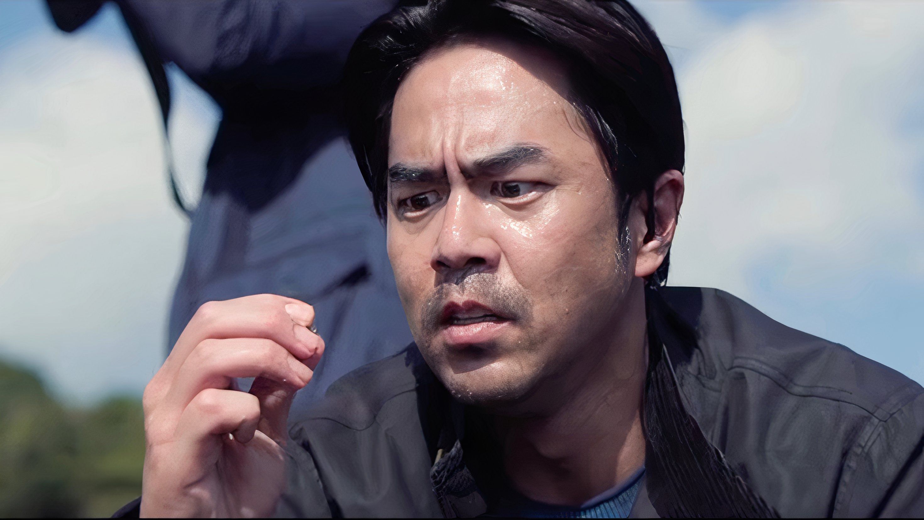 Choi Woo-seok investigating a tracking device in Squid Game Season 2.