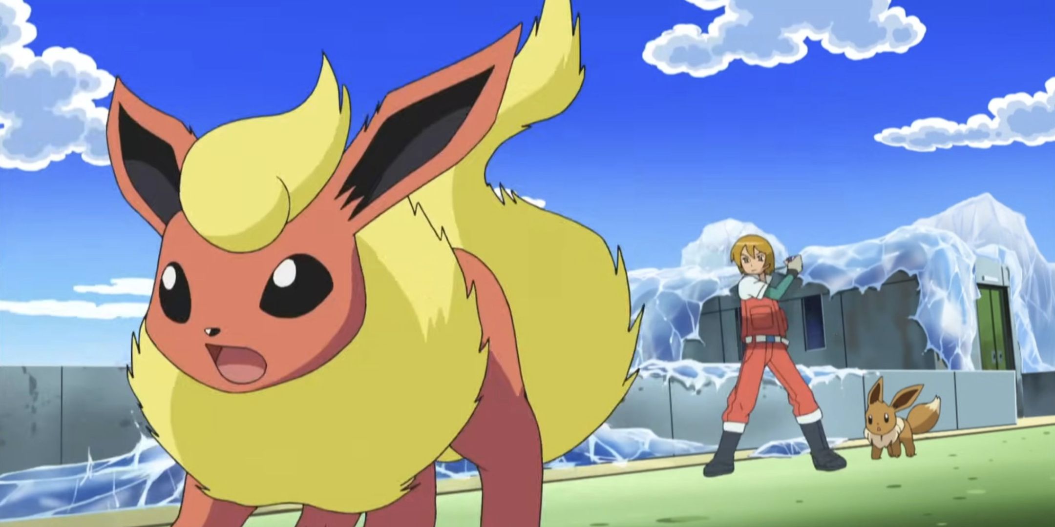 Virgil sends out Flareon while standing next to his Eevee in the Pokemon anime.