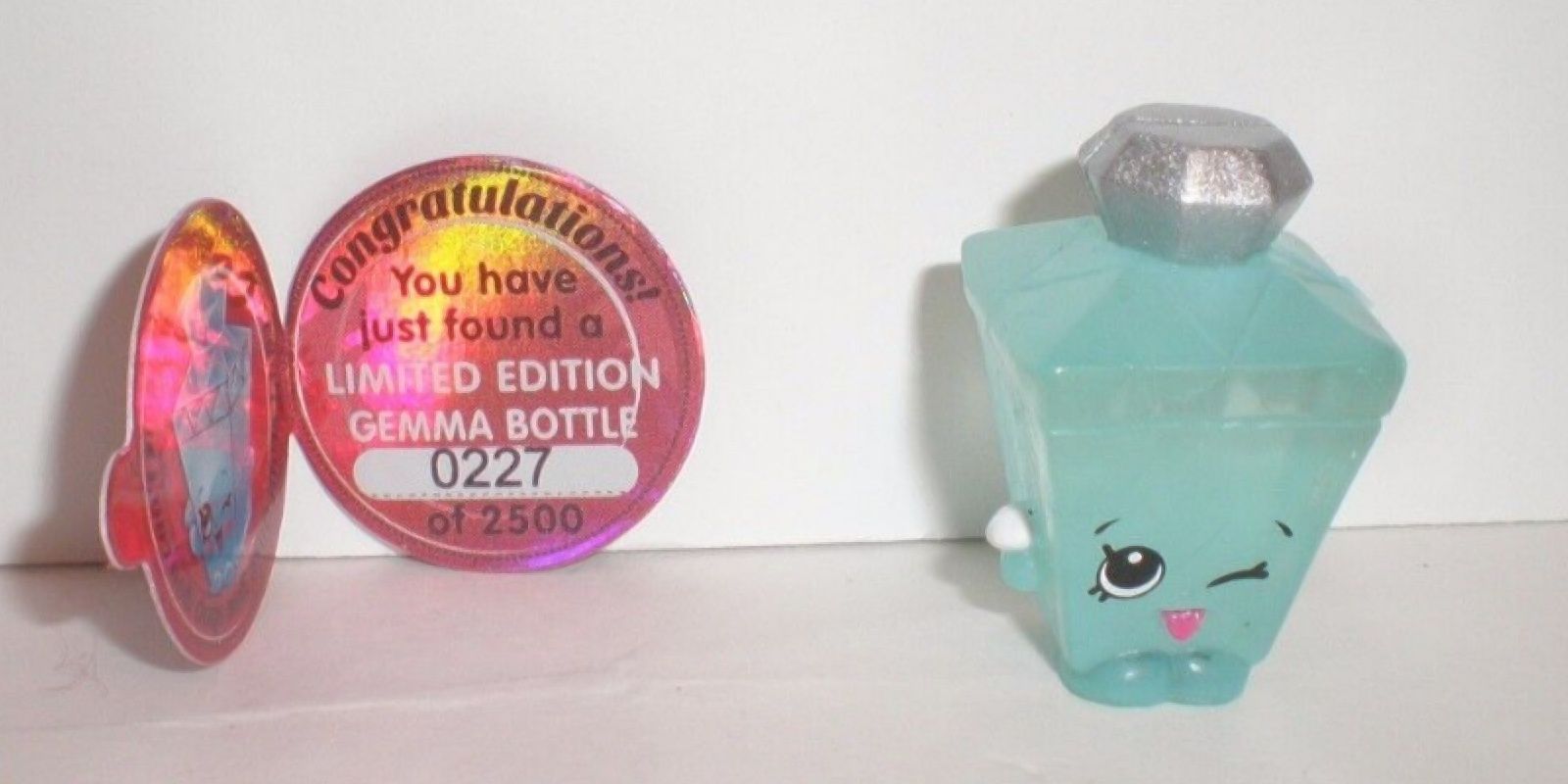 Image of them Gemma Bottle Shopkin with her limited edition tag.