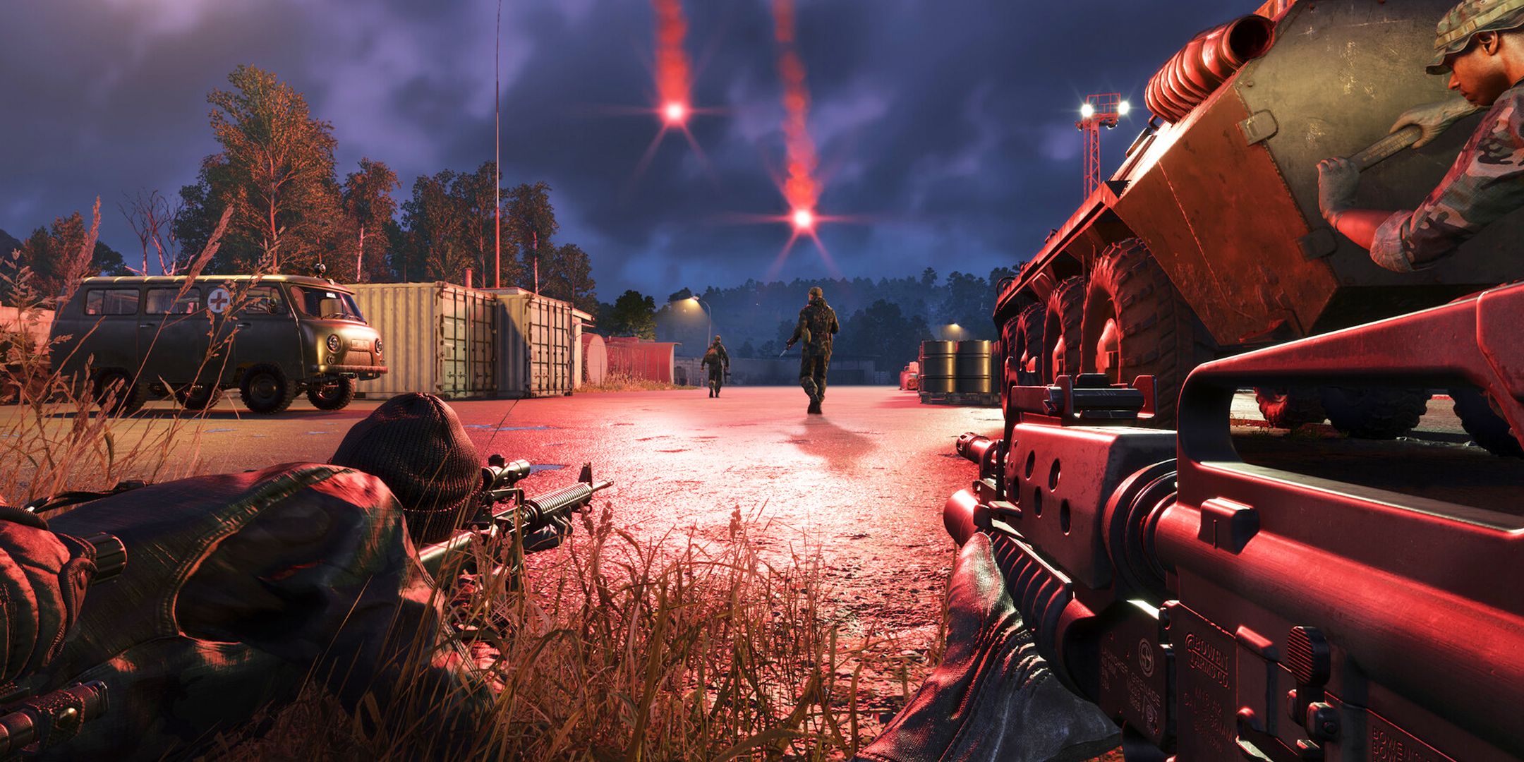 Arma Reforger player lying down in the grass, hiding from two soldiers.
