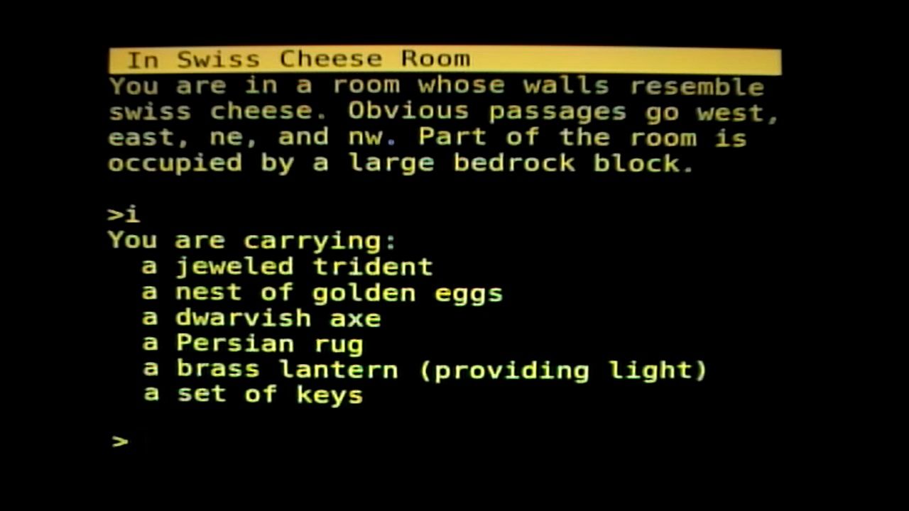 A black screen that portrays the text -based statement based on a landscape in the great cave adventure.
