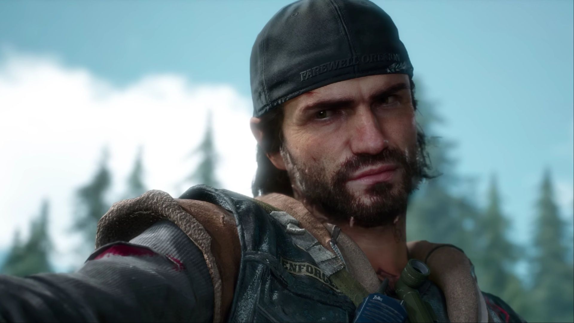 Deacon St. John pointing his gun at a Freaker in Days Gone Remastered.
