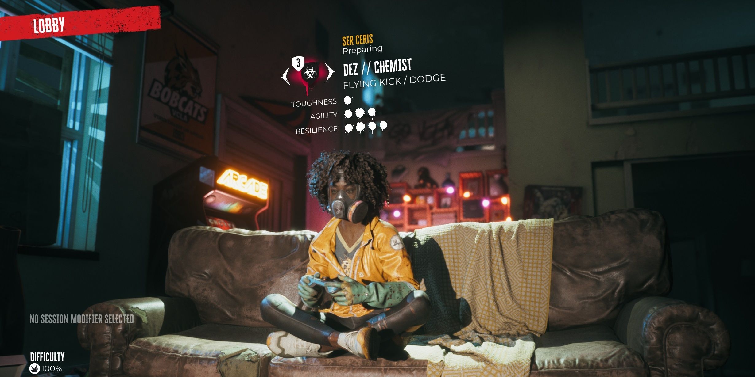 Dez in yellow, playing video games on a couch in a messy room in Dead Island 2.
