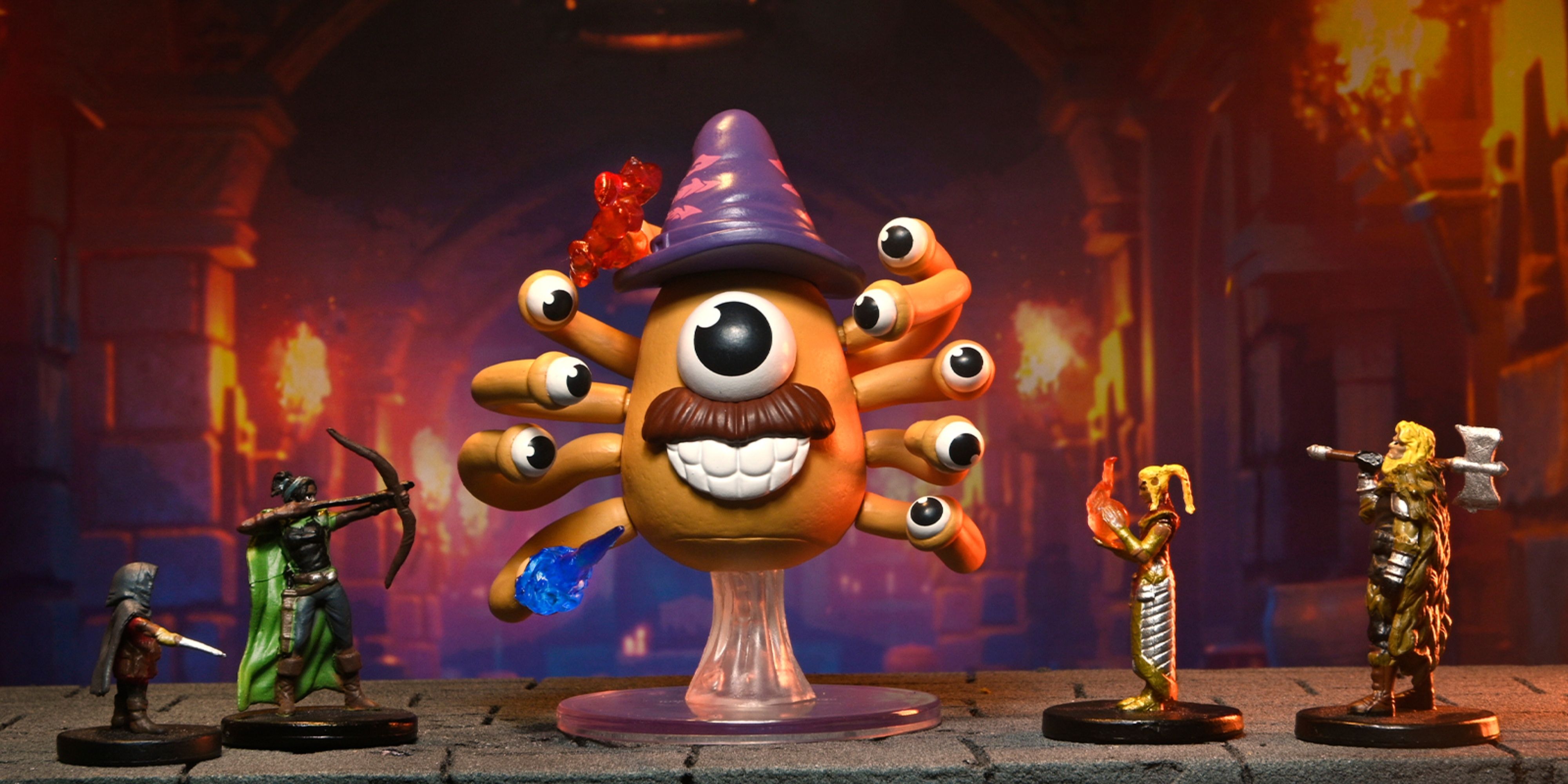 d&d mr potato head beholder miniature surrounded by other d&d miniatures.