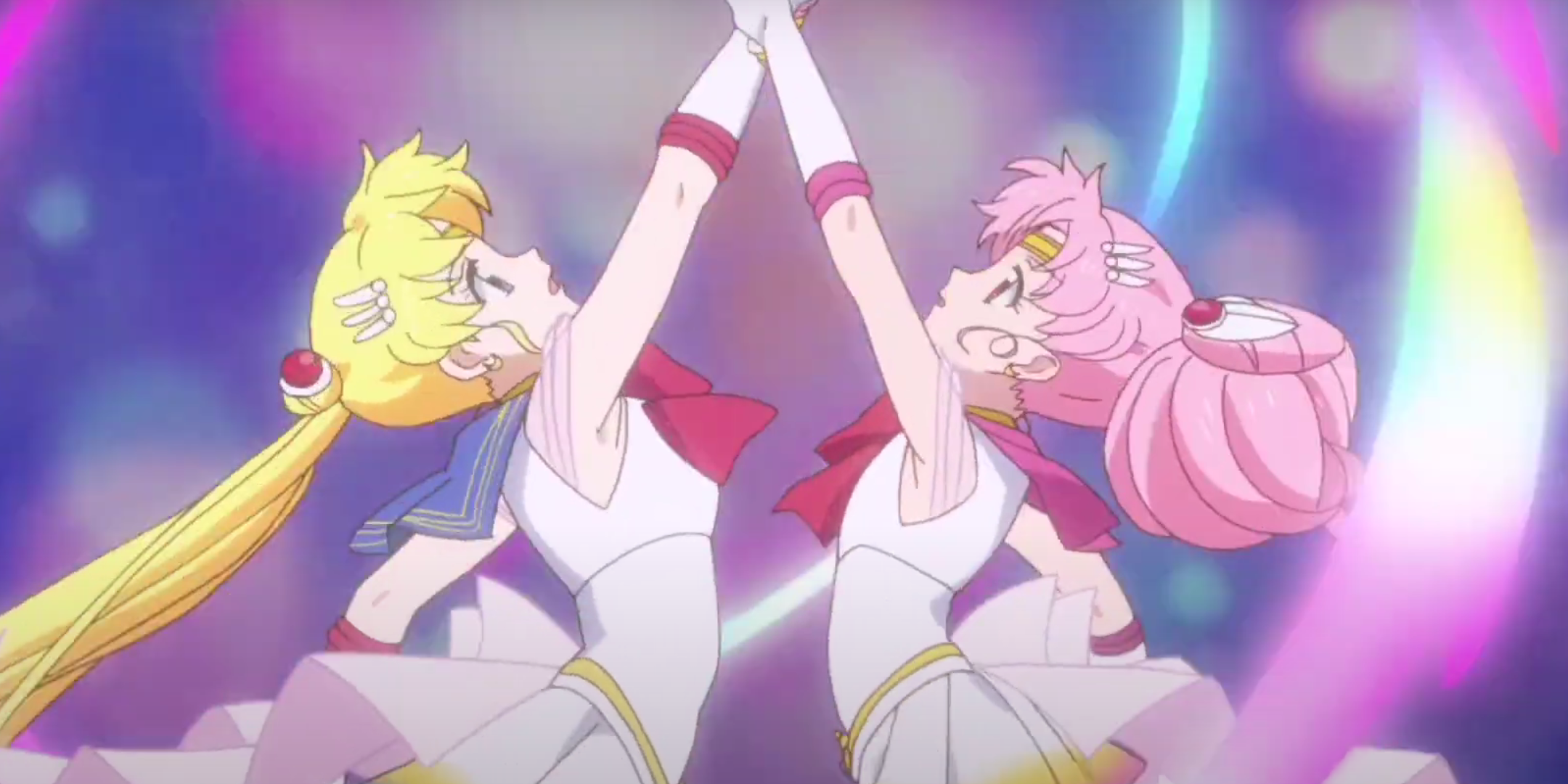 Sailor Moon and Sailor Chibi Moon preparing for an attack.