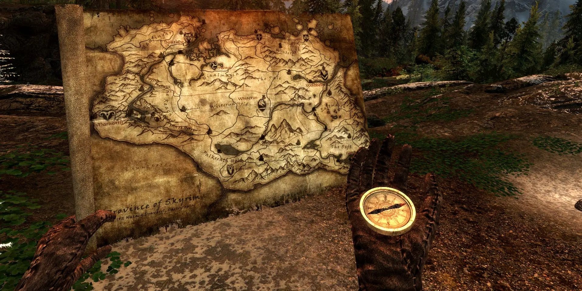 Skyrim: A physical map and compass shown inside the mod.