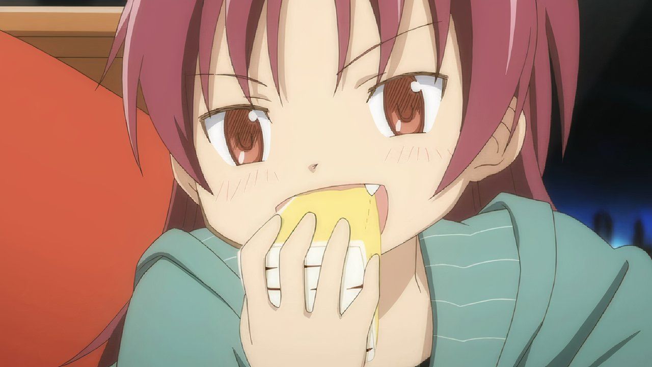 Pola Magi Madoka is eating a close -up of Kuko Sakura's character Kuko Sakura.