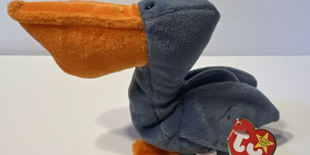 A pelican toy sits on a table